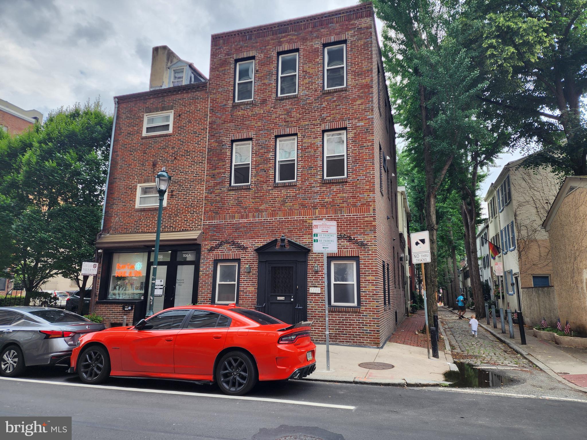Welcome to 1108 Locust Street - An exceptional opportunity to own a beautiful, fully occupied triplex in the heart of Philadelphia's highly sought-after Washington Square West neighborhood. Apartment 1 | First Floor + Partially Finished Basement: Spacious bi-level 1-bedroom, 1.5-bath residence featuring a versatile bonus room—perfect as a home office, den, or guest space. This well-appointed unit offers a modern kitchen and bath. Currently leased for $2,500/month. Apartment 2 | Second Floor: Beautifully renovated 1-bedroom, 1-bath apartment showcasing a contemporary kitchen with a center island, spacious walk-in closet, and a stylish tiled bathroom. Currently leased for $2,000/month. Apartment 3 | Third Floor: Bright and inviting 1-bedroom, 1-bath apartment with a spacious walk-in closet. Currently leased for $2,000/month. Property Highlights: Fully occupied with a current gross monthly rental income of $6,500, separate gas and electric meters, individual water heaters for every apartment, central air conditioning and heating throughout, in-unit washer and dryer in all three apartments, and beautifully, renovated hallway. Prime Washington Square West Location - ideally situated just steps from some of Philadelphia's best cafés, restaurants, boutiques, and neighborhood favorites. Enjoy easy access to Pennsylvania Hospital, Jefferson University Hospital, PATCO, the Broad Street Line, Regional Rail, and multiple bus routes, making commuting throughout the city and beyond incredibly convenient. With modern upgrades, dependable cash flow, and an unbeatable Center City location, 1108 Locust Street presents a wonderful opportunity to own a turnkey, multi-family property in one of Philadelphia's most desirable neighborhoods.