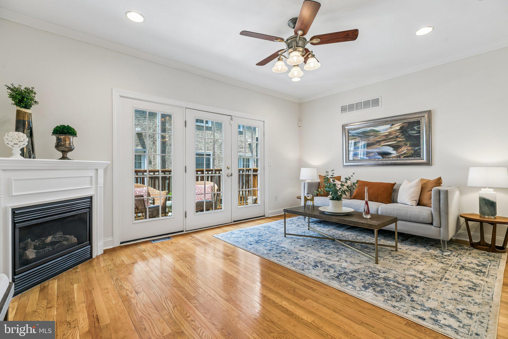 Welcome to 624 S. 27th Street, a beautifully designed residence offering the perfect blend of space, functionality, and urban convenience on the edge of Fitler Square within the highly sought-after Albert M. Greenfield School Catchment. Complete with garage parking, four bedrooms, three full bathrooms, multiple flexible living spaces, and three outdoor areas, this home delivers exceptional city living. The entry level features a spacious bedroom suite with a full bath and direct access to a private rear patio, creating the ideal setup for guests, an au pair, in-law accommodations, or a home office. Convenient access to the attached garage is located just off the foyer. The second floor serves as the heart of the home, showcasing a bright and expansive open-concept living and dining area with a gas fireplace, charming bay window, built-in desk nook, and seamless access to a private deck—perfect for outdoor dining, entertaining, or simply unwinding. The adjoining kitchen is thoughtfully appointed with granite countertops, tile backsplash, stainless steel appliances, and abundant cabinetry. Occupying its own level, the impressive primary suite offers a true retreat. Highlights include a generously sized bedroom with a dressing area, bay window with plantation shutters, a walk-in closet, and French doors opening to a Juliette balcony. The luxurious ensuite bath features an oversized glass-enclosed shower, double vanity with granite countertop, and a relaxing jacuzzi tub. A conveniently located laundry area sits just outside the suite. The fourth floor offers two spacious, sun-filled bedrooms with double closets and a well-appointed hall bath. Above, on the fifth floor there is a versatile bonus room provides endless possibilities as a den, office, fitness space, or guest room, while an adjacent attic offers excellent storage. Crowning the home is a spectacular rooftop deck with sweeping Philadelphia skyline views that can be enjoyed day or night. Ideally situated just moments from the Schuylkill River Park and Trail, neighborhood cafes (Rival Bros. Coffee, Townhome), acclaimed restaurants (Pine Street Grill, Illata, Trattoria Carina), grocery stores, and green spaces, this home also offers easy access to the University of Pennsylvania, Children's Hospital of Philadelphia, HUP, Drexel University, 30th Street Station, and major commuter routes. Combining generous living space, desirable amenities, and an unbeatable location, 624 S. 27th Street truly has it all.