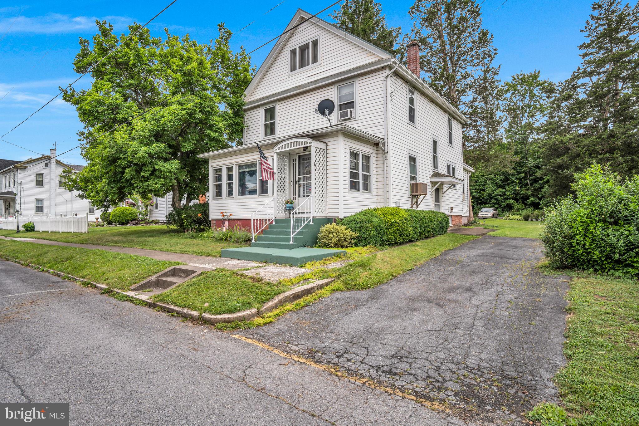 Right in the heart of Newport Borough, this home puts you within blocks of the schools, a great cup of coffee, the library, grocery store and more. The double lot gives you the kind of space most borough homes can't offer and you'll appreciate the off-street parking in both your driveway and detached garage/workshop.
Inside, four bedrooms and a finished attic bonus room give you the flexibility to grow into this home on your own terms. The heated sun porch is a dream for plant lovers and slow Saturday mornings alike. A rare find in a home this age, the mudroom with laundry keeps life a little cleaner and a little more organized. Gather around the table in the formal dining room, admire the original woodwork throughout the home, and feel the character that only a well-loved 1900s home can offer.  Be one of the first to see it at our First Look Open House this Saturday from 11-1 or schedule your tour today!