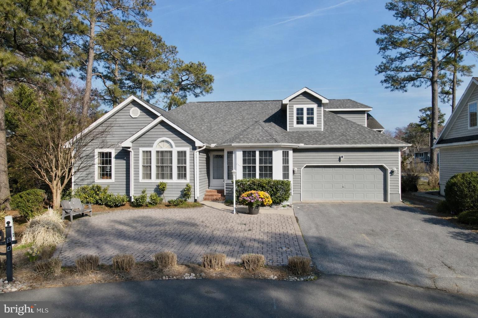 Coastal Tranquility and Refined Living in Bethany Glen

Experience the perfect blend of expanded living space and absolute serenity in this rare in-town Bethany Beach single-family home. Situated east of the canal within the quiet enclave of Bethany Glen, this residence offers a unique opportunity for those seeking a true private sanctuary. To preserve the peaceful character and high quality of life within this intimate neighborhood of just 18 homes, Bethany Glen is a strictly non-rental community, ensuring your coastal retreat remains a quiet haven for owners and their guests.

The home provides immediate peace of mind with a brand-new roof installed in March 2026 and modern dual-zone HVAC systems replaced in 2026 and 2024. The thoughtful layout prioritizes main-level living, featuring a smart split-floor plan with three bedrooms and 2.5 baths on the first floor. A front office provides a quiet workspace, while the heart of the home is defined by an expansive open-concept kitchen, dining, and family room. This central gathering area flows seamlessly into a beautifully enclosed rear patio, which serves as a second family or media room for year-round enjoyment.

The property has been meticulously expanded to include a private upper-level suite over the two-car garage. Featuring a full bedroom and bath, this space acts as an ideal multigenerational retreat or a secluded guest wing. For added convenience, the home is being conveyed partially furnished, including five wall-mounted Smart TVs that transfer with the property.

Outdoor living is equally impressive, featuring a rear deck perfect for relaxation and an outdoor shower for easy transitions from the sand to the home. Parking, often a challenge in town, is a significant asset here; the oversized parking pad and garage accommodate up to eight vehicles. The property also includes one Bethany parking permit, with the option for a second.

Located just steps from the Bethany trolley and within easy reach of the boardwalk, shops, and dining, this home offers the best of the beach lifestyle without the noise of a rental-heavy neighborhood. Discover the rare combination of size, location, and the enduring quiet of a deed-restricted residential community at Bethany Glen.