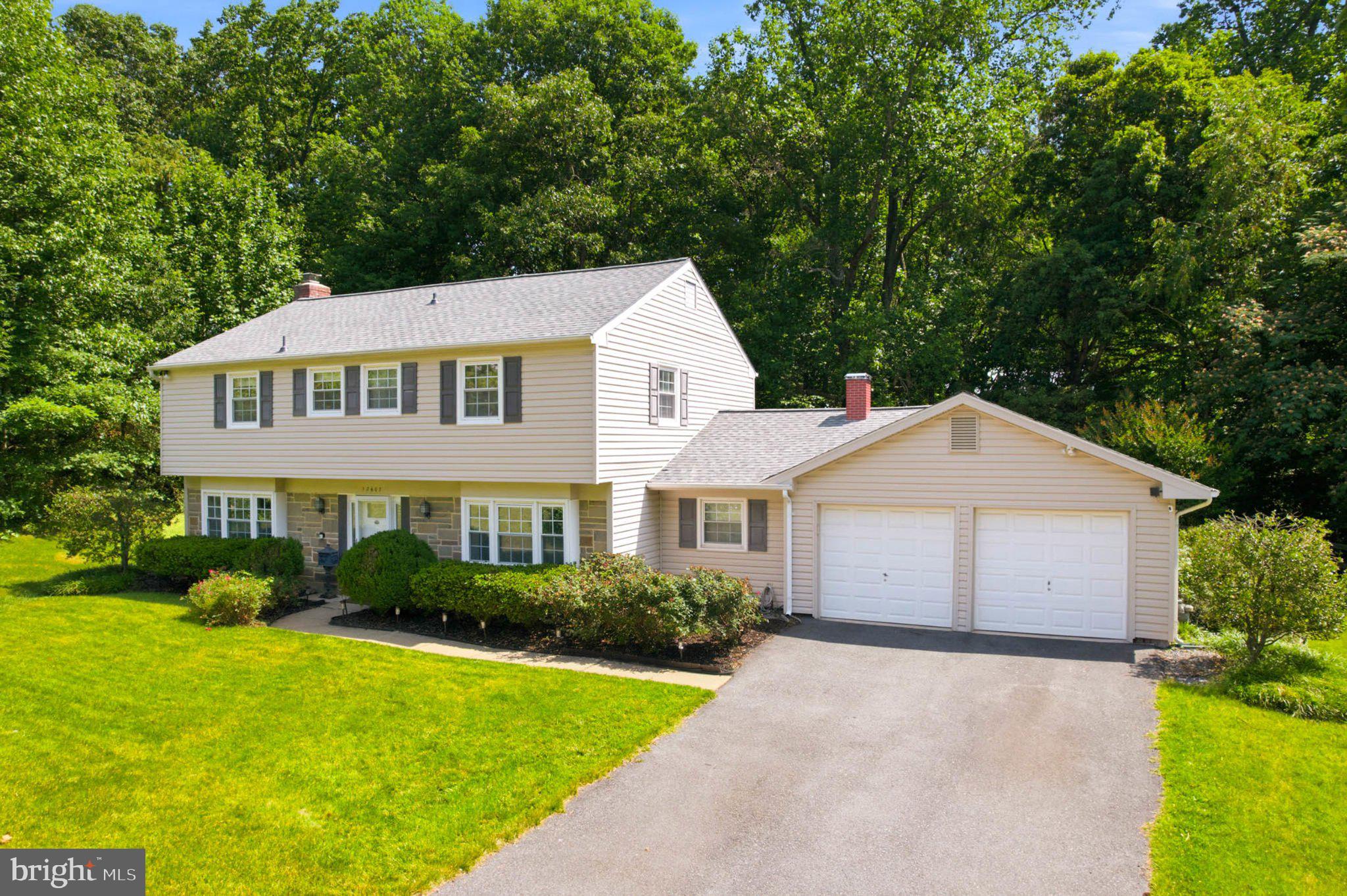 Welcome to 12607 Ivystone Ln a lovely Eton Colonial, and a standout model in the vibrant Montpelier community. From the moment you arrive, the lush lawn and manicured gardens set a polished tone that carries throughout the entire property. Peace of mind comes standard here, highlighted by a brand-new architectural-shingle roof installed in June of 2026 with a transferable warranty. 

Step through the elegant reception foyer into a home designed for both connection and comfort. The spacious living room, anchored by a wood-burning fireplace, serves as an inviting centerpiece for cozy evenings or lively gatherings. The heart of the home is the eat-in kitchen, featuring granite countertops and links to a large additional living area. A formal dining room, a convenient half bath, and a dedicated laundry room round out the main level.

Upstairs, the primary suite offers a private retreat complete with a walk-in closet and an ensuite full bath. Three additional well-proportioned bedrooms and a second full bath ensure plenty of space for everyone.

The outdoor space is a true highlight, featuring a spacious concrete patio. For those with hobbies or storage needs, the two-car garage provides ample room to stay organized.

Living in Montpelier means enjoying an array of community amenities, including a private pool, tennis and basketball courts, a playground, and ball fields. The location is unbeatable for commuters, situated directly off Route 197 with quick access to the Baltimore-Washington Parkway, I-95, I-495, and the ICC. Plus, you’re just moments away from the charm of Laurel’s Historic Downtown Main Street District. Make sure you mark your calendars for this property, it's a must-see!