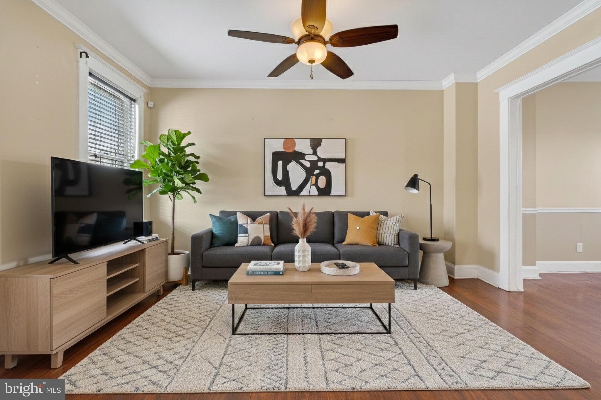 MAJOR PRICE REDUCTION! Classic charm meets a modern twist with this beautiful home! Your new home awaits and provides all the feel good "at home" qualities you have been looking for! Great commuter access for car free convenience, easy commute to downtown Baltimore, hospitals, and major employers. STRONG rental potential for investors! You will fall in love with the high ceilings as you enter and large foyer where you can venture into your spacious living room or into your kitchen with classic oak colored cabinets and stainless steel appliances! Your kitchen serves as an eat-in option with a breakfast bar area perfect for your morning or late night meals and to host guests! Right off of your kitchen you will find your backyard oasis that has been pristinely landscaped with all of the right finishing touches and the option to open your fence and have off-street parking! As you make your way to the finished basement you will find your half bath, additional rec room, separate sizable laundry room, and more storage space! Perfect for guests or just a quiet night at home enjoying your personalized area! Your upper level includes 3 ample sized bedrooms and a full bathroom! Take note of the ceiling fans installed in every room to have additional air flow on those warm summer nights! You will see and feel the love and care that has been put into this home over the years. Don't miss your opportunity for homeownership with a space that already feels like your home! SOLD AS IS