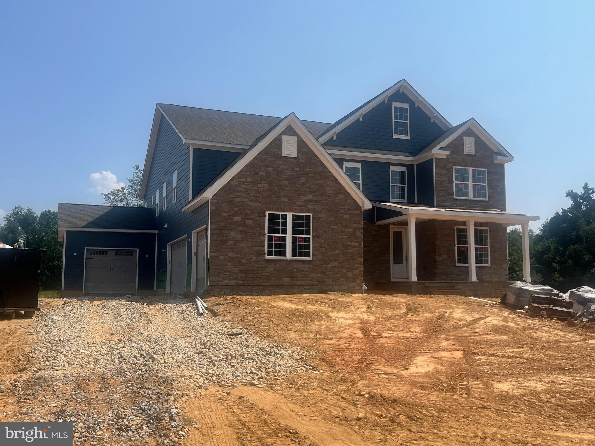 **September Move in available!!** Country meets luxury living on this sprawling 1.5 acre ultra private homesite, with just over 4,600 sqft above grade, complete with a finished basement, bedroom and full bathroom on main level and 4 car garage. The Hampton features an extensive grand 2-story foyer, formal dining room, tray ceilings, and fireplace. The chef's kitchen includes a double oven, stainless steel appliances and walk-in pantry. Basement includes a finished rec room, bedroom and full bathroom. Price listed is for finished home, upgrades already included. *Photos not of actual home, and are of a similar model*