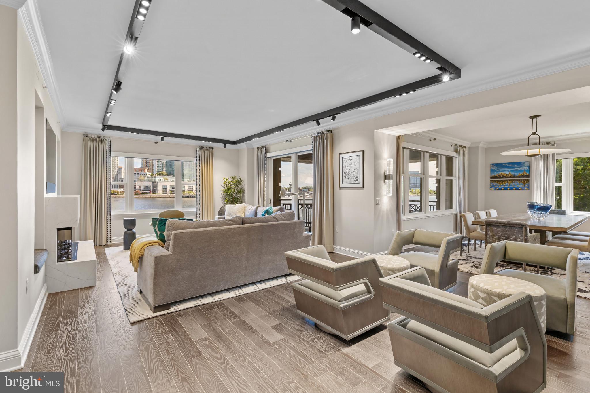 Experience waterfront living at its finest in this spectacular two-bedroom, two full and one-half bath residence with over 2,650 square feet of refined living space. Every detail reflects superior craftsmanship in this recent renovation, from the designer finishes and custom millwork to the expansive open layout that frames sweeping water views. Thoughtfully designed for both everyday comfort and effortless entertaining, this home blends timeless elegance with contemporary luxury. Residents enjoy exclusive access to on-site fine dining, a full-service marina, and a state-of-the-art medical and wellness spa, along with 24/7 concierge, valet, doorman, and porter services that define the Ritz-Carlton standard. Additional lifestyle amenities include an indoor pool, fitness center, theater, six private guest suites, and elegantly appointed event and entertaining spaces nestled within manicured gardens. Perfectly positioned on the Baltimore Promenade, with direct access to the waterfront, water taxis, and cultural landmarks, this home is just minutes from the city’s art scene, stadiums, Penn Station, and BWI Airport. Schedule your private showing today.