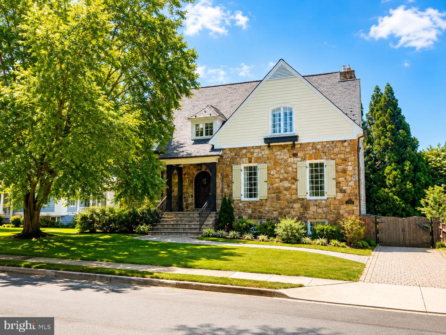 Welcome to 3212 N. Rochester Street, a meticulously maintained custom-built home offering over 4,300 square feet of elegant living space in the heart of North Arlington. Located in the highly sought-after Yorktown High School Pyramid, this exceptional residence features 4 bedrooms, 3.5 baths, a heated two-car garage, and a private, fully fenced backyard designed for both everyday living and entertaining.

The thoughtfully designed main level offers an ideal blend of formal and casual spaces, including a gourmet eat-in kitchen, formal dining room, formal living room, spacious family room, private home office, main-level bedroom with a full bath, and more!

The beautifully updated kitchen is a chef's dream, featuring custom cherry cabinetry, granite countertops, stainless steel appliances, a large cooktop, wall oven, warming drawer, microwave, a generous pantry, and abundant storage. The kitchen flows seamlessly into the inviting family room, where a stunning floor-to-ceiling stone fireplace serves as the focal point. French doors open to the expansive rear deck, creating the perfect setting for indoor-outdoor entertaining.

The formal living room offers a second fireplace with an elegant marble surround and mantel. Just beyond, a private office with floor-to-ceiling windows provides an ideal work-from-home space. A main-level bedroom with an adjoining full bath offers exceptional flexibility for guests, an au pair, or multigenerational living.

Upstairs, retreat to the luxurious primary suite featuring a spacious bedroom, dressing area with a built-in dresser, multiple closets including a large walk-in closet, and a spa-inspired en-suite bath with dual granite vanities. Two additional generously sized bedrooms share a well-appointed hall bath with double sinks. The upper-level laundry room includes front-loading washer and dryer units along with a built-in ironing board for added convenience.

The finished lower level offers outstanding versatility, with a large exercise room that could easily serve as a fifth bedroom, powder room, or a finished storage room, and direct access to the oversized, heated, rear-entry two-car garage.

Step outside to enjoy the private, fully fenced backyard. The expansive deck overlooks beautifully landscaped grounds, while stairs lead to a spacious patio—an ideal setting for relaxing, entertaining, or enjoying peaceful evenings outdoors.

Every inch of this remarkable home reflects exceptional pride of ownership, timeless craftsmanship, and thoughtful design.

What makes this location truly exceptional? Enjoy an easy walk to the East Falls Church Metro (Orange and Silver Lines), the Williamsburg Shopping Center, neighborhood parks, restaurants, and everyday conveniences. Easy access to major commuter routes. This home offers the perfect combination of luxury, convenience, and one of North Arlington's most desirable locations.****Additional details and professional photos to come!