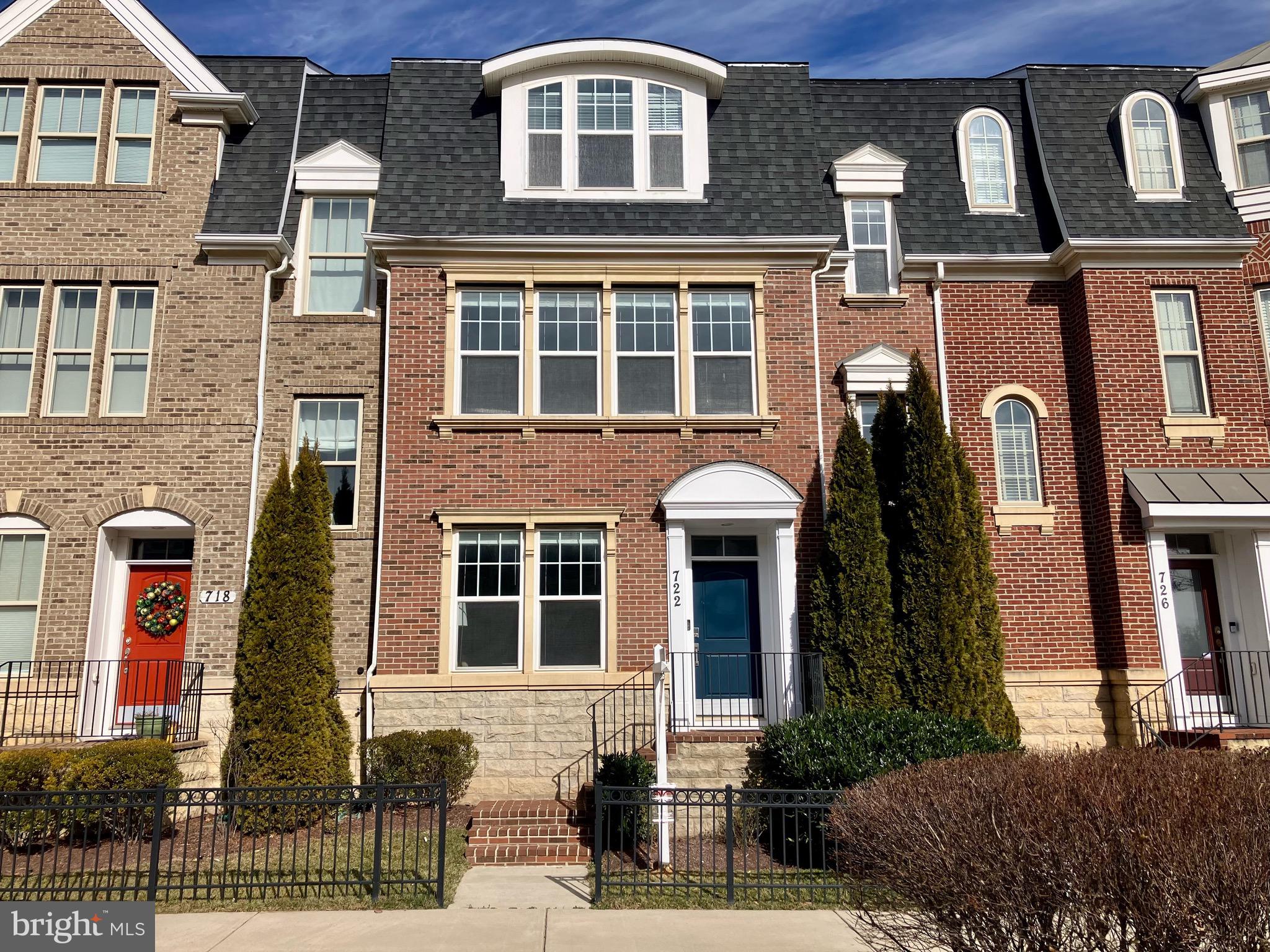 Absolutely beautiful brick-front home in Downtown Crown. Built by KB Homes, who built the widest town homes in the community, so you have more space on three floors, with fewer steps to climb. The home is move-in ready with brand new carpet and fresh paint. You will love all of the upgrades, including beautiful wood floors, recessed lighting, crown molding, tray ceiling and many more. The entry level includes a flexible space and a full bath, giving you lots of options for use. Head upstairs to the thoughtfully laid-out main level. The great room provides the best in open-concept living, with a gourmet kitchen that lets you hold court with all of your guests. There is also a separate living room, for those times when you need a little quiet. The deck in back is perfect for morning coffee or grilling. There is even a powder room tucked in back. Retreat upstairs to the private areas of the home, with the primary suite boasting tons of light, its own ensuite bath and walk-in closet. Two more generous bedrooms, a second full bath and laundry complete the top floor. There is ample space to park with a 2-car garage, two additional spots in driveway behind garage, and even more parking on-street for guests. You are ideally situated within the Downtown Crown community, kitty corner from the clubhouse, gym and pool - an easy run back if your forget your towel or sunscreen. Enjoy all the walkability that Downtown Crown offers, without being subjected to the nightlife noise.  Available for rent on or before April 1st 2024...Improvements and updates being made to the property thru March 6th