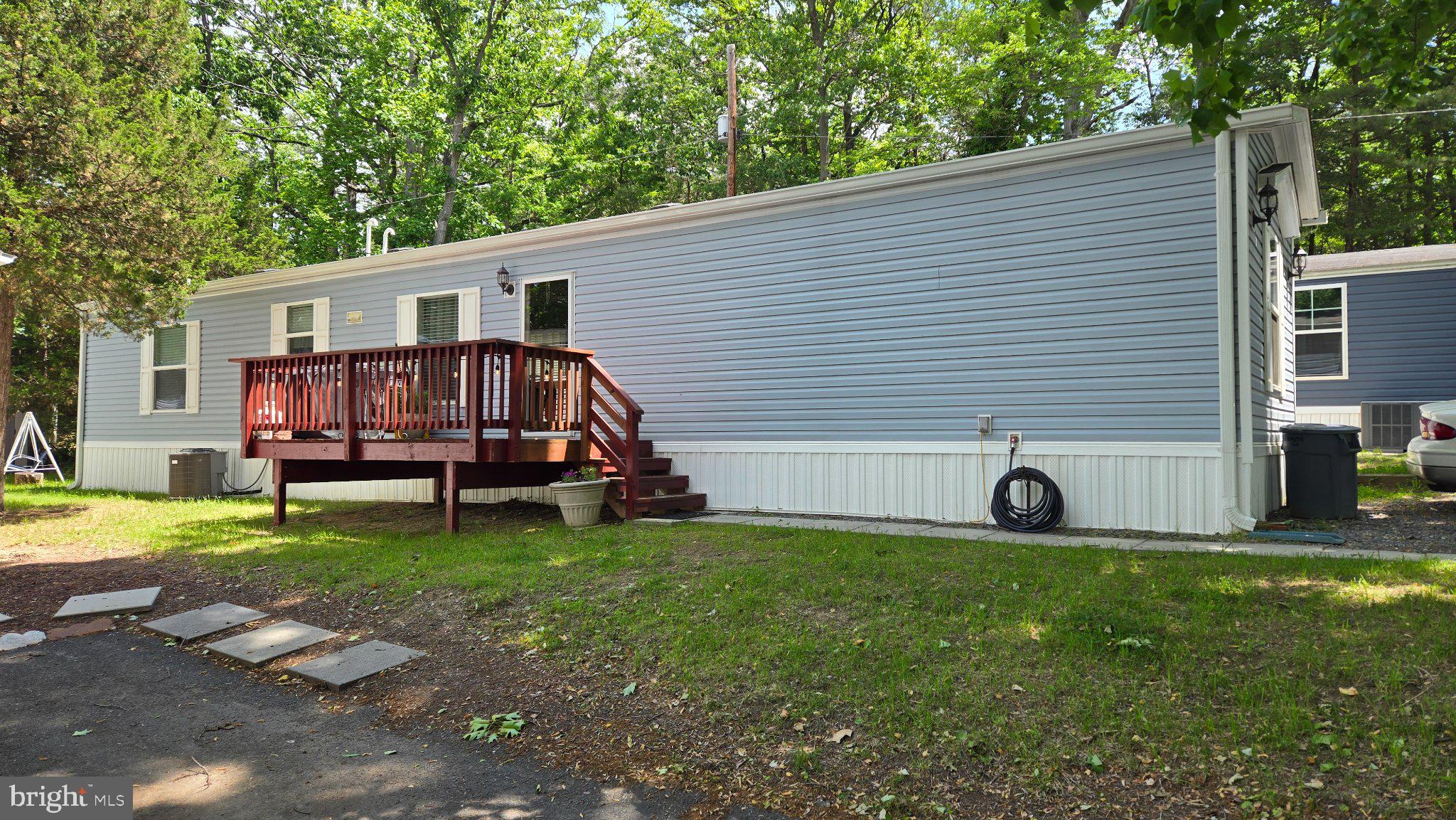 PRICE REDUCTION: Seller is under contract with home of choice. 
Nestled in the charming Holiday Mobile Estates, this exquisite 2021 Clayton manufactured home offers a perfect blend of modern luxury and comfortable living. With a spacious layout of 3 bedrooms and 2 full bathrooms, this single-wide home is designed to cater to your every need, providing an inviting atmosphere that feels just like home. The heart of the home is undoubtedly the kitchen where cooking and entertaining flow with delight. Natural light floods the living spaces through energy-efficient windows. This home is not just a place to live; it's a sanctuary where you can unwind and create lasting memories. Whether you're entertaining friends or enjoying a quiet evening at home, this property offers everything you need for a fulfilling lifestyle. Don't miss the opportunity to make this exceptional residence your own. Incoming buyer will need to be approved by Holiday Estates through interview process and background and credit check there is a $25 application fee. Pets are welcomes just NO DOGS, NO WORKING ON CARS, NO WASHING CARS.