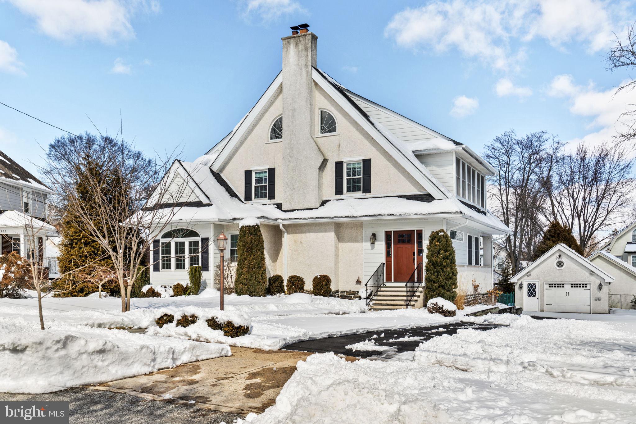 Set on a very large level lot in the heart of the beloved Penfield neighborhood of Haverford Township is this incredible 5 bedroom, 4 full, 1 half bath Colonial home.  Offering amazing versatility with lots of extras, great square footage, beautiful finishes and one of the best locations in town, you will be so proud to call this home.  The current owners did a wonderful job creating a one of a kind gem that offers amazing function for everyday life and a great flow for hosting and entertaining.  Pull up and immediately notice the large lot with private drive, detached garage, large backyard and elevated details such as the bluestone walkway and front stairs.  The front door leads you into an amazing mudroom with built-in benches and hooks and a door that leads right out to the deck.  The first floor has an amazing floorplan to include a gorgeous living room with a fireplace flanked by built-ins, a nicely sized dining room that opens right up to the gorgeous kitchen with white princess quartzite countertops, center island, plenty of shaker cabinets, great lighting and slate tiled floor.  Off the kitchen is the perfect sunfilled breakfast room with another door out to the deck.  Off the kitchen is a butlers pantry, great for setting up a bar for parties.  Also on the first floor you’ll find a great den space, perfectly tucked away powder room and designated in-home office that would also make a great playroom.  The gorgeous original wide staircase is intact and leads you up to a very large 2nd floor.  4 huge bedrooms, 2 of which share a full bath, a large sunporch that spans the back of the home and could have any function you’d like and a renovated hallway bathroom with double vanity and high end tilework.  The primary suite on the 3rd floor offers a huge space, full bath and large walk-in closet.  Enjoy a room large enough for a sitting room, another office or dressing room.  All 5 bedrooms in this home are very large in size which is rare for an older home.  The basement offers a rec room space, 4th full bathroom, tons of storage, designated laundry room and stairs that lead you out back.  There is so much storage space at every turn.  All the bedrooms have large closets, there is attic storage on the 3rd floor and the basement and garage offer tons as well.  This home has so many special details and is truly a one of a kind.  Built to last and updated for today's lifestyle makes it the best of everything,  Dual zoned central and heat, newer roof on the home and garage and just loved all over!  The location cannot be beat!  Penfield is the perfect pocket of town, hugging Brookline and its attractions and Penn Wynne.   Walk to Brookline Blvd for breakfast, lunch or dinner, schools, the Grange Estate Park and Playground and the train in just minutes.  This home was built to last and has been cherished by its current owners.  Call her yours, today!