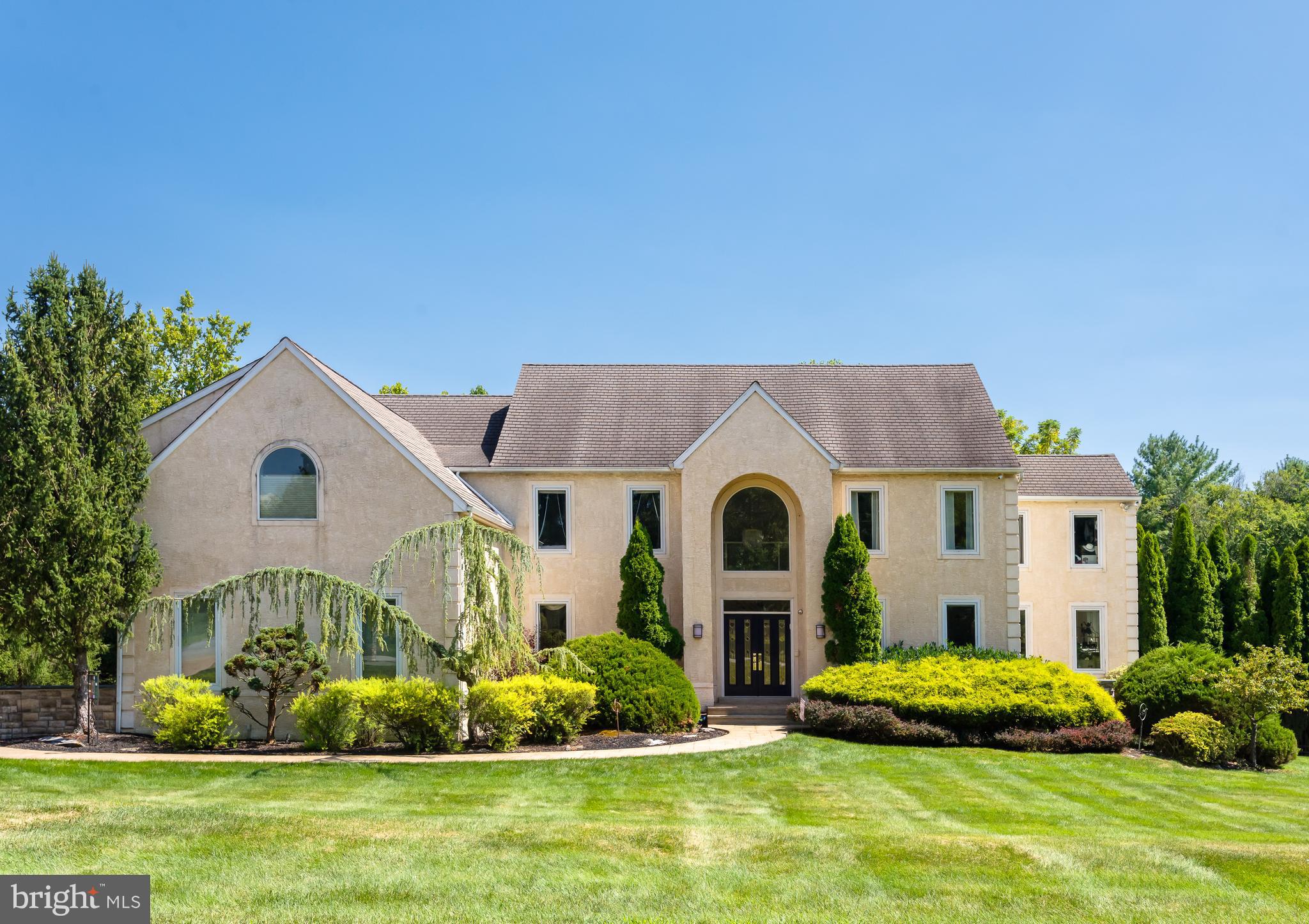 Decide now to buy this well priced exquisite home on a quiet cul-de-sac in the coveted T/E school district. This 5 bedroom, 4 full bath 2 half bath home was expanded in 2001 by the sellers. Some of the home’s highlights are the enlarged primary suite, a custom designed gourmet kitchen, Sonos system interior and exterior “rock” speakers, finished lower level with wet bar, full bath, movie theater & gym, an in-ground pool, a multi-tiered trex deck and newer HVAC systems. Enter the foyer with hardwood floors found here as well as the formal dining room and living room. The gourmet kitchen boasts ceramic tile flooring, 42” Maple cabinets, granite tops, backsplash and built-in desk with matching granite, island with lots of storage and 5-burner electric Thermador cook top, 2 wall ovens, built-in refrigerator, trash compactor, breakfast area with egress to the multi-tiered trex deck with a 4’ Lynx gas grill. The Butler’s pantry also boasts granite tops and custom cabinetry and entry to the dining room and kitchen. The 2022 carpeted family room with cathedral ceiling is off the kitchen & features a marble surround gas fireplace and custom designed entertainment wall unit. An additional 15X20 room on this level is the office with large windows flooding the room with natural light. Go downstairs to the carpeted finished lower level equipped with custom designed granite topped wet bar, custom lighted cabinets, lighting underneath the countertops, a full bath accessible to the pool, pocket door with entry to the movie theater with all the bells and whistles, a gym equipped with a Murphy bed and egress to the pool via a stamped concrete pool deck. The second level features 5 bedrooms, 3 full baths one being a hall Jack and Jill. The primary suite is enormous and one can enjoy the trey ceiling, the private deck off the main bedroom via a slider, entry to the expanded primary bath, two walk-in closets and the laundry room. This bath offers a loo, a bidet, porcelain tile flooring, Corian 2-sink vanity with a Robern mirrored medicine cabinet, huge stall shower with 4 jets, rain head and shower head, a Jacuzzi with jets and walk-in linen closet. His walk-in closet off the bath has a Bessler stair to the floored attic. Her walk-in closet is a room in itself with a built-in “make-up” area, mirrored wall, a lot of room to hang one’s clothes and luggage storage area behind one of the walls. The laundry room is adjacent to this closet and is equipped with a new washer/dryer, Corian topped sink, ceramic tile floor and built-in ironing board. The back exterior is an oasis featuring a pickle ball/tennis court, basketball court, in-ground heated pool recently renovated with new gunnite, new tiles, hot tub, slide and diving board and automatic closing pool cover. Also out back is a putting green and tether ball. The HVAC systems were installed in the last few years along with the water heater & expansion tank. Since ownership, the sellers have replaced the majority of windows, installed a Generac Generator which addresses most of the house, built a TEK system in the 3-car garage for storage, epoxied the garage floor, and painted the interior in 2020 and 2023. The mud room is right near the garage entry and has cabinets for storage of coats, shoes and boots.There is lovely exterior uplighting, an in-ground lawn sprinkler system, beautiful landscaping, a concrete stamped driveway, a concrete stamped front walk as well as a concrete stamped pool deck. Move right into this gorgeous home close to major arteries, Wegmans, Target, The Chester Valley Trail, the prestigious King of Prussia Mall for easy shopping and many delicious restaurants. (interior photos forthcoming)