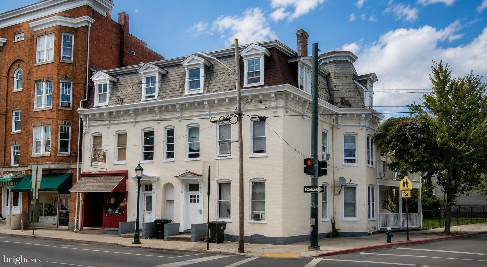 Excellent Investment Opportunity in Downtown Hagerstown! This prominent corner mixed-use property at 158 1/2–160 S. Potomac Street features three income-producing residential apartments and one commercial storefront, offering exceptional cash-flow potential. Ideally situated just one block from Meritus Park, home of the Hagerstown Flying Boxcars, this property is perfectly positioned to benefit from the continued growth of downtown. Conveniently located near shopping, restaurants, entertainment, public transportation, and many other local attractions, it offers an unbeatable location for both residential and commercial tenants. A rare opportunity to own a well-located mixed-use investment property in the heart of Hagerstown.