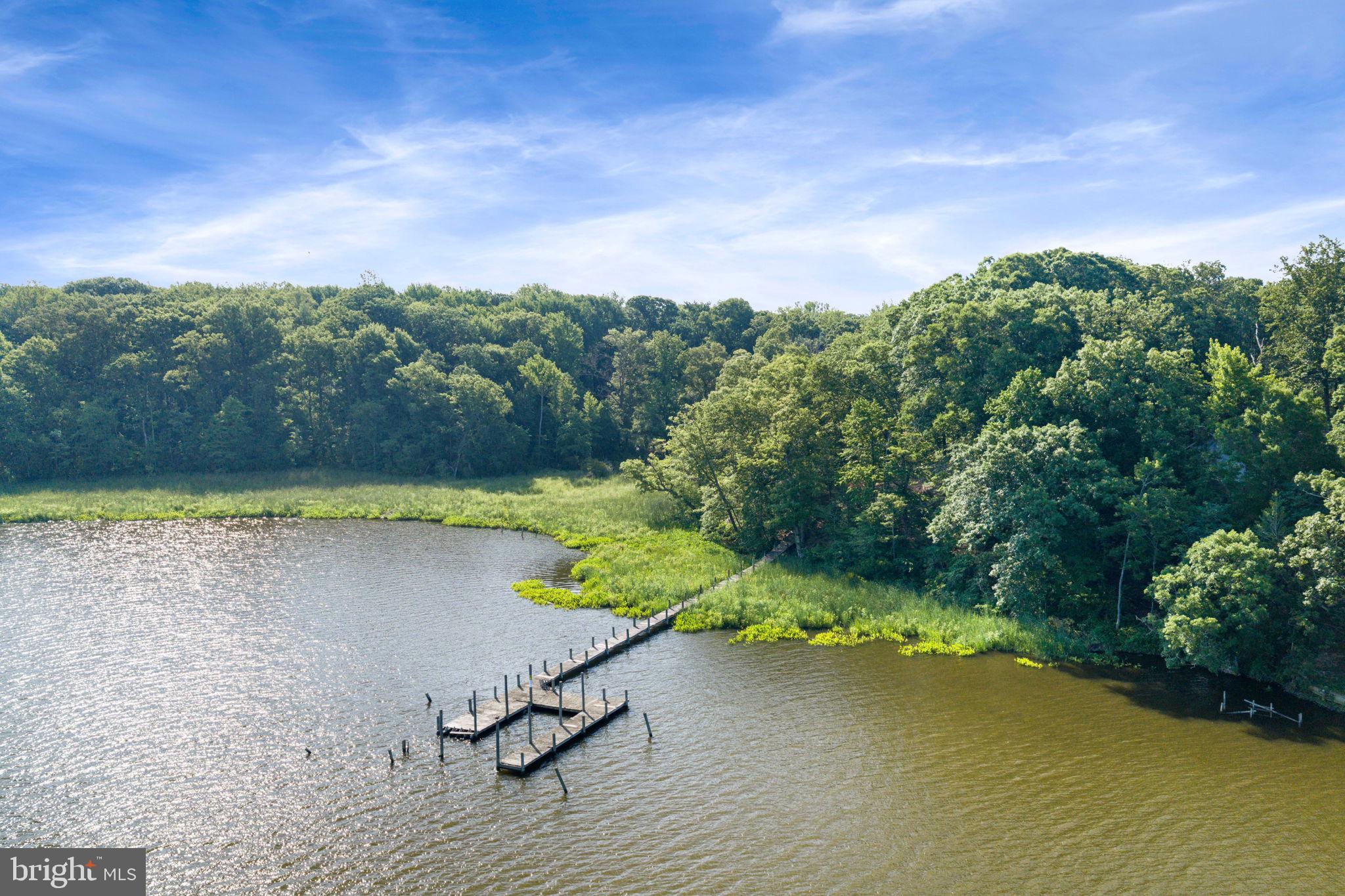 A rare opportunity to create your own waterfront retreat on 2 acres along Aquia Creek. With approximately 150 feet of shoreline, this property offers a beautiful waterfront setting with space, privacy, and water views that can shape the design of your future home. An established driveway, shed, and private dock  are already in place, giving you a head start as you bring your vision to life. The dock creates a natural connection to the water—perfect for launching a kayak, fishing, boating, or simply relaxing and taking in the peaceful creek views. The dock and shed are as-is.  Previous soil work available.  The dock has electricity and electricity runs to the end of the property.  Please see documents section for house location survey and site plan.
