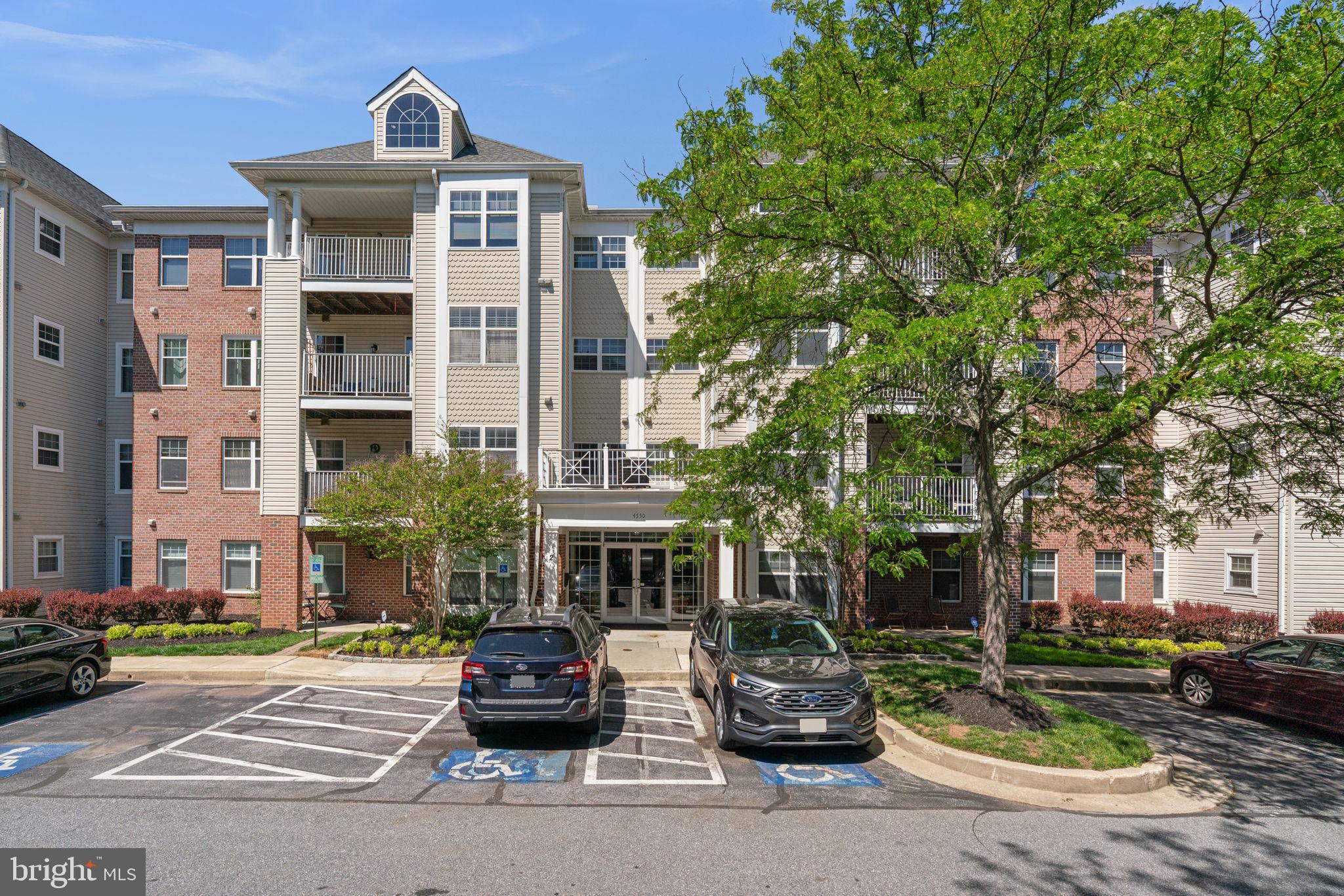 Contemporary condominium residence offering 2 bedrooms, 2 bathrooms, and 1,896 finished square feet in desirable Beckett Green. // Freshly painted throughout, the home opens to a foyer with updated flooring and entry to a well-appointed study or home office. Ahead, the spacious living room features a fireplace, a wall of mirrors that enhances natural light, and a ceiling fan for added comfort. Just off the living room, the formal dining area is highlighted by a chandelier and classic chair rail detailing. // Continue into the sunlit eat-in kitchen with gleaming floors, stainless steel appliances including a newly added refrigerator, white shaker-style cabinetry, a large walk-in pantry and laundry room combination, and a bright breakfast area. // On the opposite side of the home are two bedrooms and two bathrooms with updated flooring. The spacious primary suite includes a walk-in closet and a private ensuite bath with a glass-enclosed shower and built-in bench. // Enjoy morning coffee, fresh air, or casual dining on the covered balcony. // Additional highlights include the peace of mind and convenience of a gated community with well-maintained common grounds. Ideally located near I-795 and public transit, with a wide variety of nearby retail and dining options.