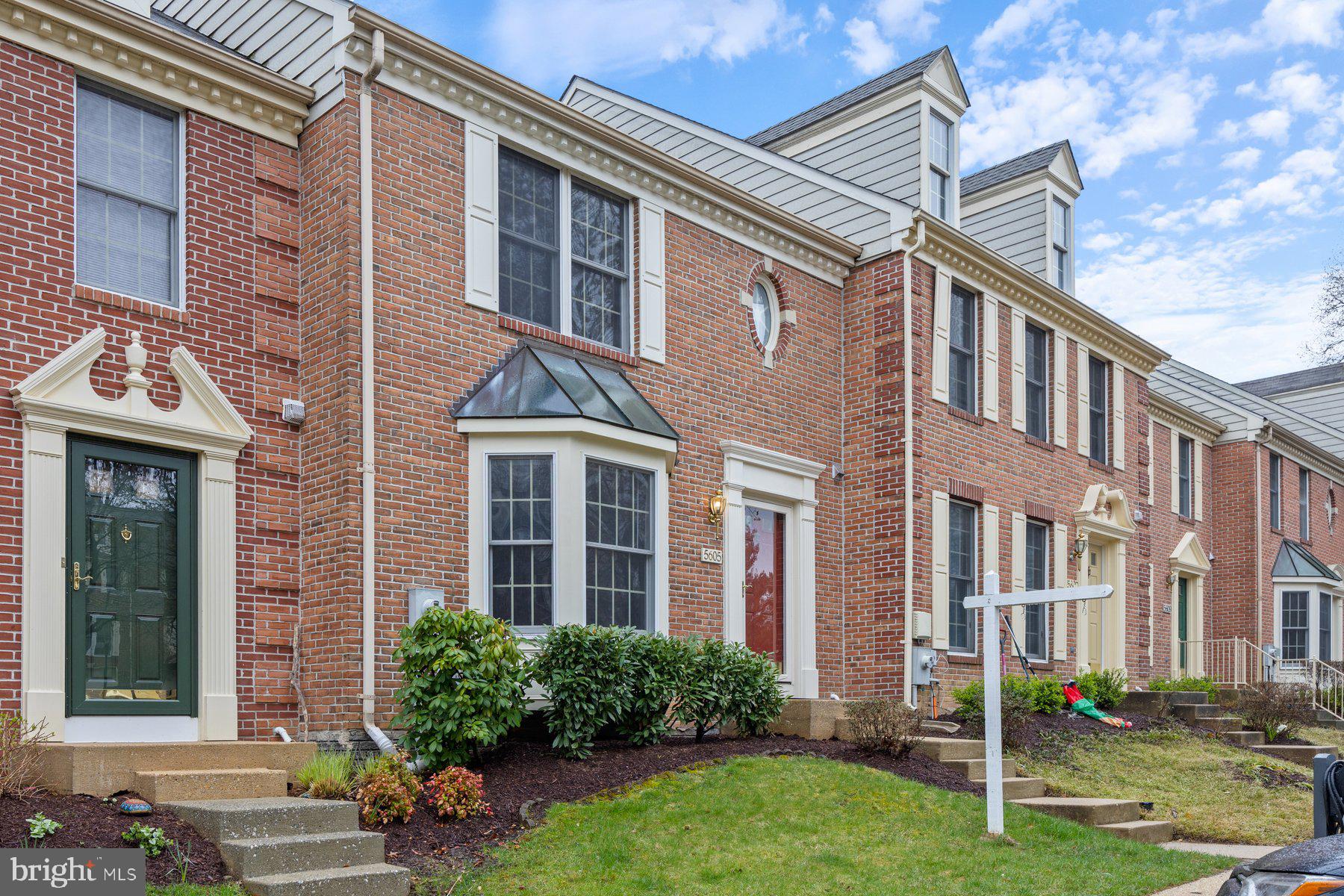 This beautiful freshly painted townhome spans three levels, offering an ideal layout for both relaxing  and entertaining. Step inside to discover an updated kitchen featuring stainless steel appliances. The warm elegance of hardwood flooring extends throughout the main two levels, adding charm and sophistication. Retreat to the spacious primary bedroom, complete with an en-suite bath for ultimate comfort and privacy. Two additional bedrooms upstairs provide ample space for family, guests, or a home office. Enjoy the outdoors with a private deck and patio—perfect for morning coffee, evening gatherings, or simply unwinding in a serene setting. Conveniently located near shopping, dining, and major commuter routes, this home effortlessly combines style, comfort, and accessibility. Don't let this gem slip away.