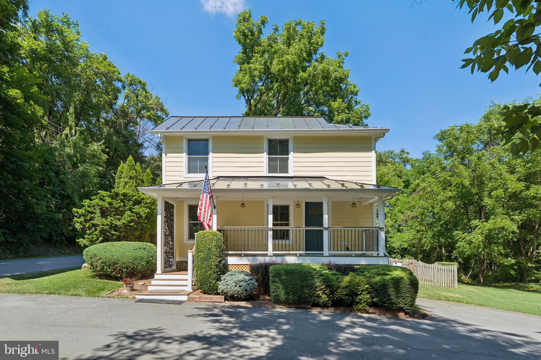 Timeless character meets modern craftsmanship in this beautifully rebuilt 1890s home, thoughtfully reconstructed in 2012 and further enhanced by the current owners. Set on a generous property with abundant wildlife, that includes an additional adjacent lot of .375 acres for a total of just shy of 1 acre, this unique offering combines historic charm with today's most sought-after features. Potential use as an Airbnb with a County special exception.

The exterior showcases durable HardiePlank siding, a standing-seam metal roof, and inviting Trex front and screened porches designed for low-maintenance living. Inside, reclaimed heart pine floors add warmth and authenticity throughout the home. The well-appointed kitchen features stainless steel appliances, granite countertops, and easy access to the screened porch, creating the perfect space for indoor-outdoor entertaining.

The comfortable living areas are highlighted by a  fireplace, while the baths are finished with elegant stone tile. Quality Andersen windows provide abundant natural light, and the home's mechanical systems include an upgraded HVAC system with humidifier and UV light for enhanced comfort and air quality. Expanded and paved parking for four or more vehicles.

Freshly painted interior and new neutral carpet just installed.

A rare opportunity to own a home rich in character, thoughtfully updated for modern living, and complemented by the added value and flexibility of an adjoining lot.

Less than 90 minutes to DC- a country retreat with modern amenities close to hiking, wineries and breweries