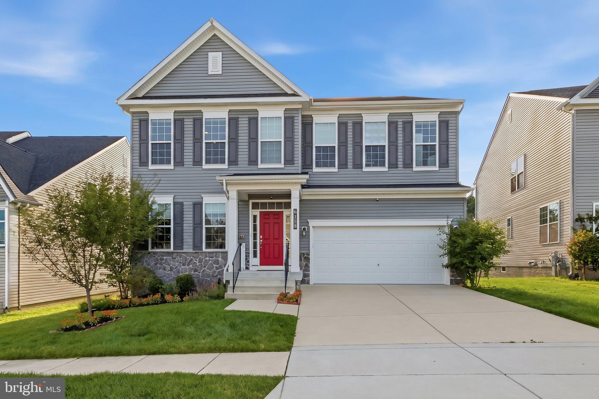 Welcome home to 6158 Flutie Lane in Clarksville's exclusive Enclave at River Hill. Built in 2021 by Beazer Homes, this Augusta floorplan feels brand new. A dramatic two-story foyer sets the tone, with hardwood flooring flowing throughout the main level. At the front of the home, a private guest bedroom with a full bathroom offers ideal flexibility for visitors or remote work. The rear of the home opens into a sweeping open-concept living space where the kitchen, eat-in area, family room, and dining room flow seamlessly together. The chef's kitchen features white shaker cabinetry, quartz countertops, stainless KitchenAid appliances, and a large walk-in pantry. The eat-in area opens directly to the screened-in back porch and spacious paver patio, while the family room impresses with a gas fireplace and remote-controlled shades. A welcome center off the two-car garage and dual coat closets add everyday practicality and function. 

Hardwood flooring continues upstairs to an elegant landing with three-piece crown moulding. The primary suite offers a lighted tray ceiling, a wall of windows, two custom-outfitted walk-in closets, and a spa-inspired bath with dual vanities, quartz countertops, and a large shower. Four additional bedrooms — two sharing a buddy bath and two sharing a hallway bath — along with a dedicated laundry room complete this level. The light-filled lower level surprises with transom windows, a traditional window, and a sliding glass door to the walk-up stairs. A spacious recreation room, full bathroom, and unfinished storage area prime for future customization round out the home. Minutes from Howard County's best dining and shopping, and with easy access to Baltimore/DC commuter routes — 6158 Flutie Lane is a rare find in one of Howard County’s most coveted locations.