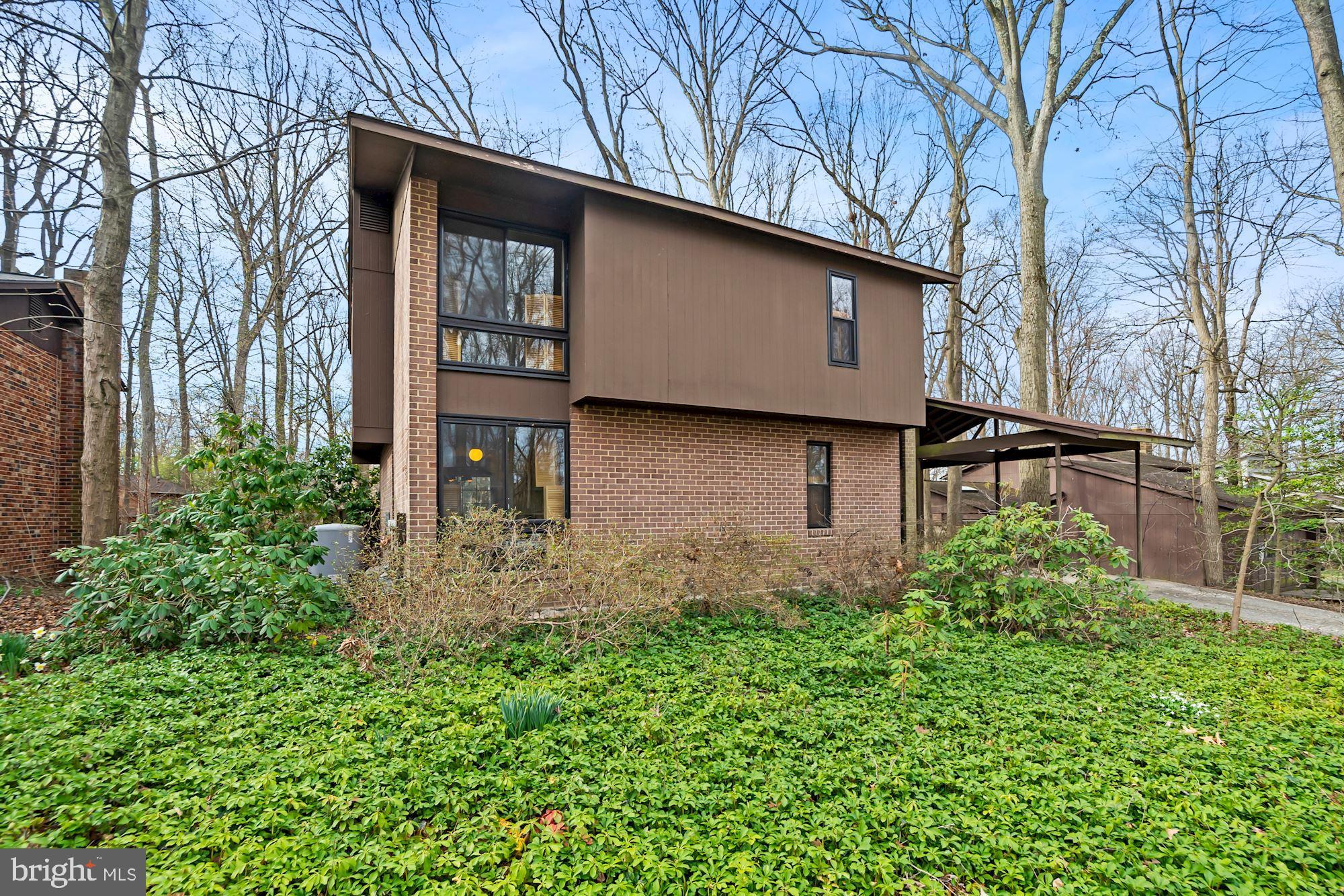 Beautiful  contemporary home situated on a private lot backing to beautiful trees and woods. The main level features a spacious sunlit living  room leading to a private patio .  Large eat-in kitchen with a spacious dining area and half bath.  The upper level features 4 generous sized bedrooms and 2 full baths.  Master bedroom features an en suite bathroom and walk-in closet.  Spacious lower level with the laundry area and plenty of storage.  Beautful hardwood flooring and fresh paint throughout.  Large carport with plenty of parking. 
Perfect location close to shopping and major highways.  A MUST SEE!!