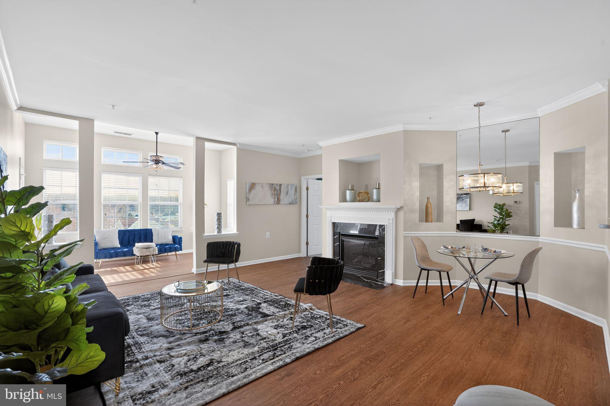 Purchase with peace of mind - 10,000 Seller Incentive – Use It Your Way!
Closing costs, rate buy-down, or upgrades—flexibility that makes this opportunity stand out in sought-after Cameron Grove. Downsize your space to upgrade your life! Welcome to penthouse-level living at 14040 New Acadia Ln #406 a beautifully renovated top-floor 2-bedroom, 2-bath condo designed for comfort, convenience, and ease. With no neighbors above and abundant natural light, this home offers a quiet, elevated living experience.

Inside, you’ll find updated flooring, modern lighting, granite countertops, refreshed baths, and a striking black marble fireplace that anchors the living space. The open-concept layout flows seamlessly from kitchen to dining to living, ideal for both everyday living and entertaining.

Enjoy wide hallways, in-unit washer and dryer, and elevator access—all within a thoughtfully designed 55+ community known for its lifestyle and amenities. Cameron Grove offers two pools, fitness center, ballroom, library, meeting spaces, and a private movie theater—everything you need just steps from your door.

Located minutes from shopping, dining, and major commuter routes, this move-in-ready home delivers low-maintenance living without compromise.