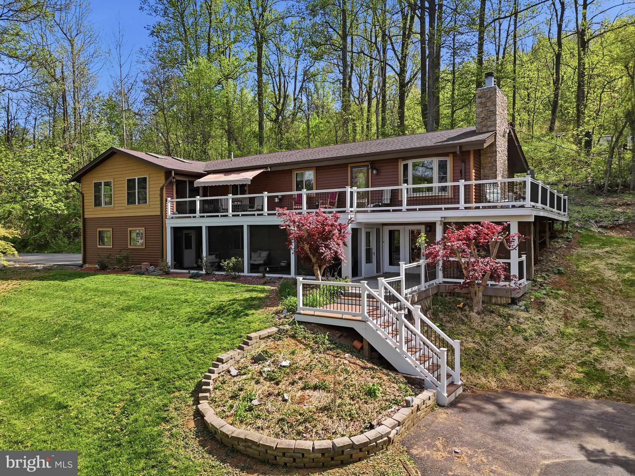 Welcome to your 4-bedroom, 3-bath mountain retreat—where comfort, charm, and natural beauty come together. This home offers the perfect escape while still providing all the space and features you need for everyday living or a weekend getaway.
Step inside to an open-concept dining, kitchen, and living area filled with natural light, creating a warm and inviting atmosphere ideal for entertaining or relaxing by the fire. 
The primary suite is a true retreat, featuring a large en-suite bathroom and a sunroom walkout that leads directly to your expansive Trex deck. Enjoy your morning coffee or unwind in the evenings while taking in serene mountain views. The retractable awning provides effortless shade, making outdoor living enjoyable in any season.
Outside, the beautifully landscaped yard enhances the home’s curb appeal and creates a tranquil outdoor oasis. 
Located within a welcoming community, you’ll love the easy walk to the private lake—perfect for fishing, peaceful reflection, or enjoying nature. With a blend of privacy, scenic views, and community amenities, this home delivers the best of mountain living.
Don’t miss this rare opportunity to own your own slice of paradise. Minutes to the town of Front Royal for all your shopping needs—schedule your showing today! Proffessional photos coming soon!