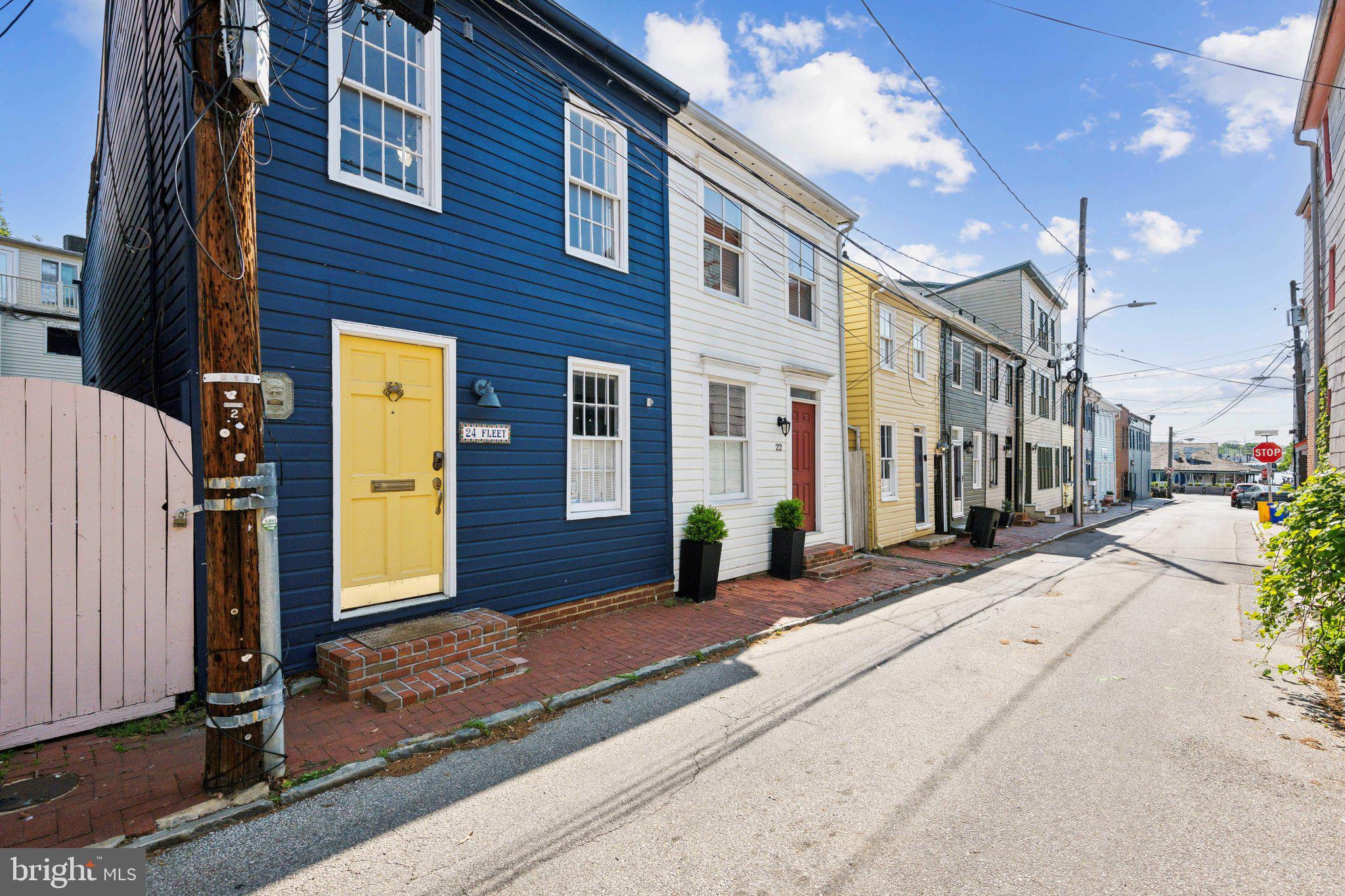 *Seller has an offer in hand. Please submit best and final by 9PM EST Monday, May 12, 2025. Seller will review offers and make a decision on TuesdayMay 12, 2025 - seller reserves the right to accept an offer before deadline*
Welcome to 24 Fleet St—a beautifully maintained 2-bedroom, 1.5-bath row home nestled in the heart of historic downtown Annapolis. This classic home blends timeless character with modern comforts, featuring hardwood floors throughout, exposed brick accents, and a sunlit living space perfect for relaxing or entertaining. The updated kitchen includes stainless steel appliances, granite countertops, and a cozy dining nook.
Upstairs, you’ll find two generously sized bedrooms and a full bath with stylish finishes. Enjoy the convenience of a main-level half bath and in-unit laundry. Step outside to a private rear patio—ideal for morning coffee or evening gatherings.
Just steps from the City Dock, U.S. Naval Academy, shops, restaurants, and waterfront parks, this location offers the best of Annapolis living. Whether you're a first-time buyer, weekend visitor, or downsizing, 24 Fleet St is a rare find with unbeatable charm and walkability.
