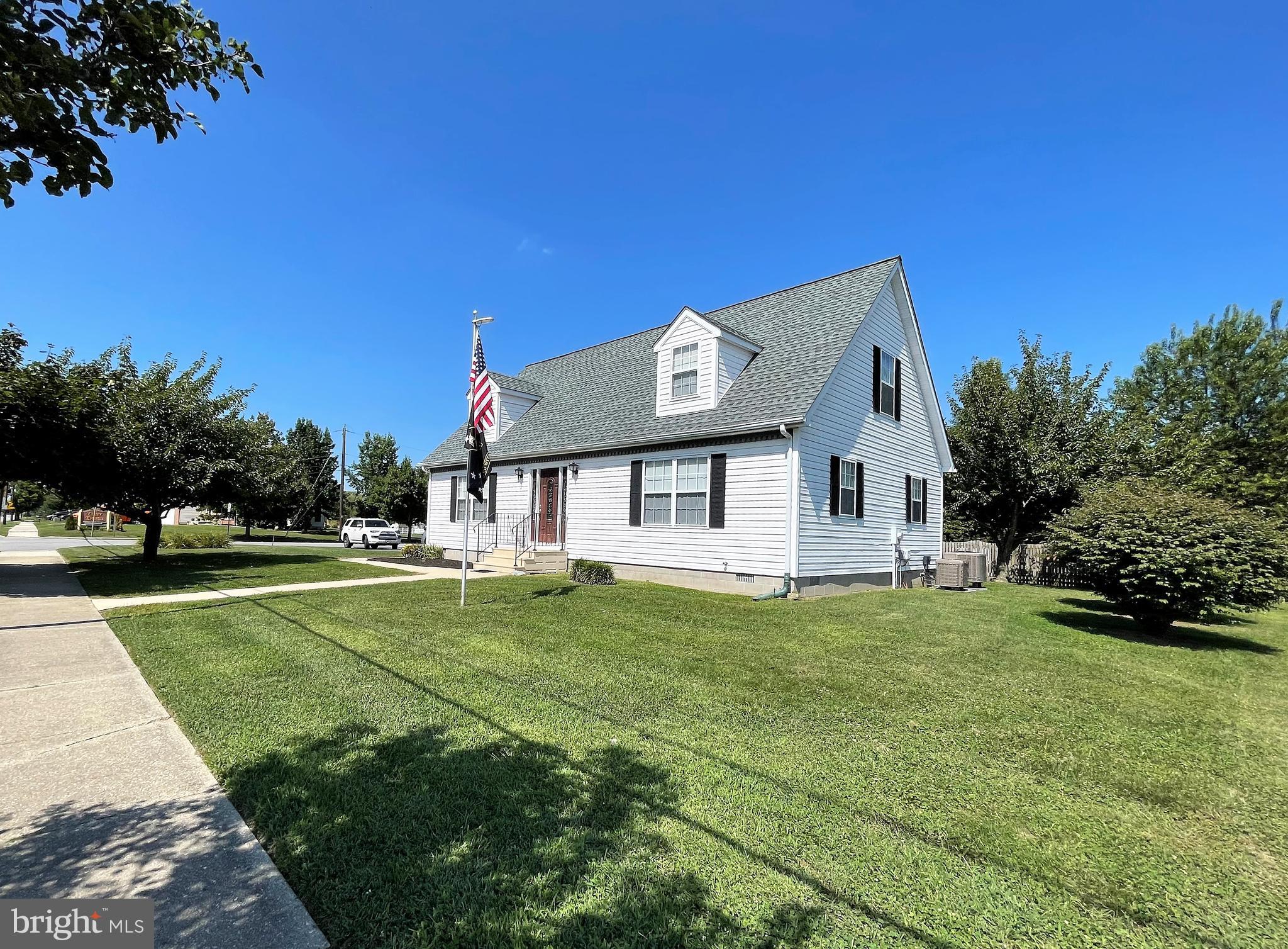 This spacious, well maintained Cape Cod on 1/3 acre  corner lot welcomes a number of different usages with the zoning (C2) allowing for business and/or residential.  The main level offers an eat-in kitchen, generous size living room, family room (office), 2 bedrooms and 1 bath.  The upper level has 2  large, light filled bedrooms and 1 bath.  Additional features include SS appliances, hardwood floors, paved driveway, newer roof and newer HVAC (dual zoned).   The perfect opportunity awaits if you want to work from home...
