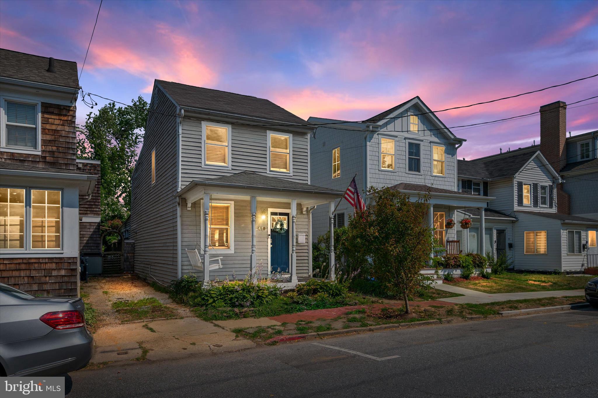 Quintessential Eastport charm in this sought-after Lower Eastport location. A welcoming front porch invites you to enjoy the vibrant local lifestyle. Inside, the light-filled layout features a spacious kitchen with a breakfast bar, a dedicated dining area, a convenient mudroom side entrance,  half bath, & first-floor laundry. The upper level offers two generously sized bedrooms and a full bath. Relax on the large, private screened-in back porch overlooking a huge, level backyard perfect for entertaining. A standout feature is the over-sized detached shed/barn equipped with mini split (Heat and AC), ideal for a workshop, home office, or studio. This move-in-ready home is steps away from marinas, street-end waterfront parks, shopping, dining, and downtown Annapolis.
