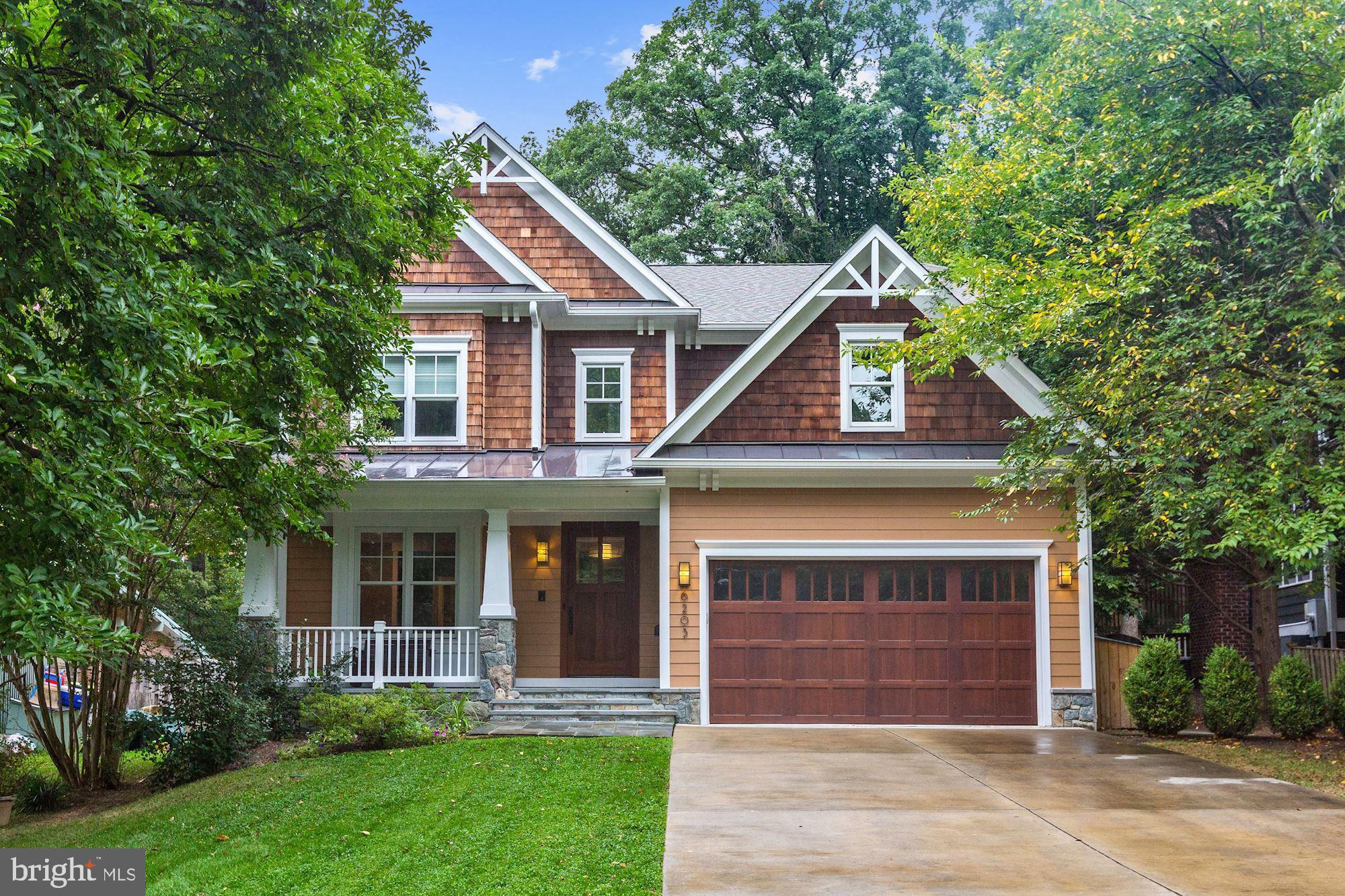 Surprise!  This 2013 Carter Inc. built custom home is a dream and it could be yours!  Current owners custom finished the interior with an Arts & Crafts meets mid-century modern a la modern farmhouse vibe; no detail missed, no expense spared.  Have the ubiquitous grey, white, neutral, new construction BLAHS??  Come hither... pay attention to detail, they did! Every fixture, lighting, plumbing, trims and finishes, hand-selected with excruciating care.  Authentic Arts & Crafts colonial set on a .25 acre lot in Bethesda's beloved Glen Echo Heights neighborhood.  Set back from the street, ample parking for guests in the long drive and a deep usable backyard to boot!  Inside, underfoot are gorgeous random width reclaimed pine floors (reclaimed from a bourbon factory, how special is that?).  Look up, look around, don t miss a thing from the foyer iron/glass pendant light to the rich neutral walls which pop against the bright white millwork throughout.  Wide stairways, wide hallways, high ceilings, loads of recessed lighting draw you in.  Back to the kitchen/breakfast area/family room, wide open... stacked stone linear gas fireplace on one end invites you to snuggle on the sofa and watch a movie. Glorious red/orange glass backsplash in the kitchen  makes a signature color statement which is woven through the home like a vibrant thread.  This is a happy place, a custom home, like new and ready for you.  Too many special details to list... you must come see. You stand apart from the masses, you have a unique style, you want something special, distinctive that will endure shifting trends and make you proud and happy to come home... this is your home.