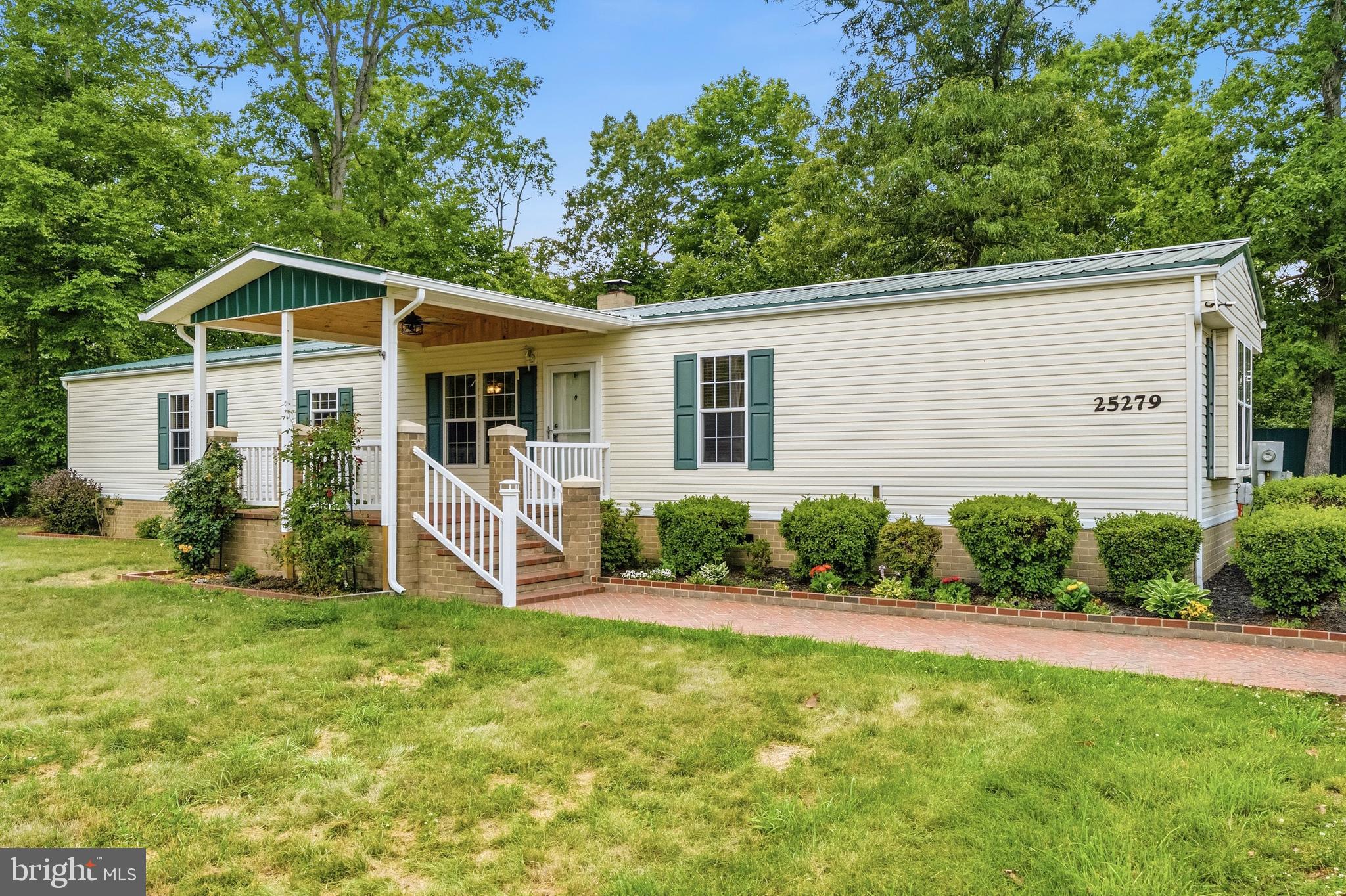 Discover the perfect blend of comfort, functionality, and country charm in this spacious one-level home featuring 3 bedrooms and 2 full baths. Warm wood flooring flows throughout much of the interior, while the updated kitchen offers modern convenience for everyday living and entertaining. The private primary suite includes a walk-in closet and a relaxing soaking tub, creating a peaceful retreat at the end of the day.

Outdoor living shines with a large covered front porch complete with a ceiling fan, ideal for enjoying morning coffee or evening sunsets. The property offers exceptional versatility with a detached garage, multiple storage sheds, a substantial barn, and a separate office building featuring two rooms and its own full bathroom—perfect for a home business, studio, guest space, or hobby area. With abundant storage, flexible workspaces, and room to spread out, this unique property provides endless possibilities while maintaining the convenience of single-level living. Shared driveway access.