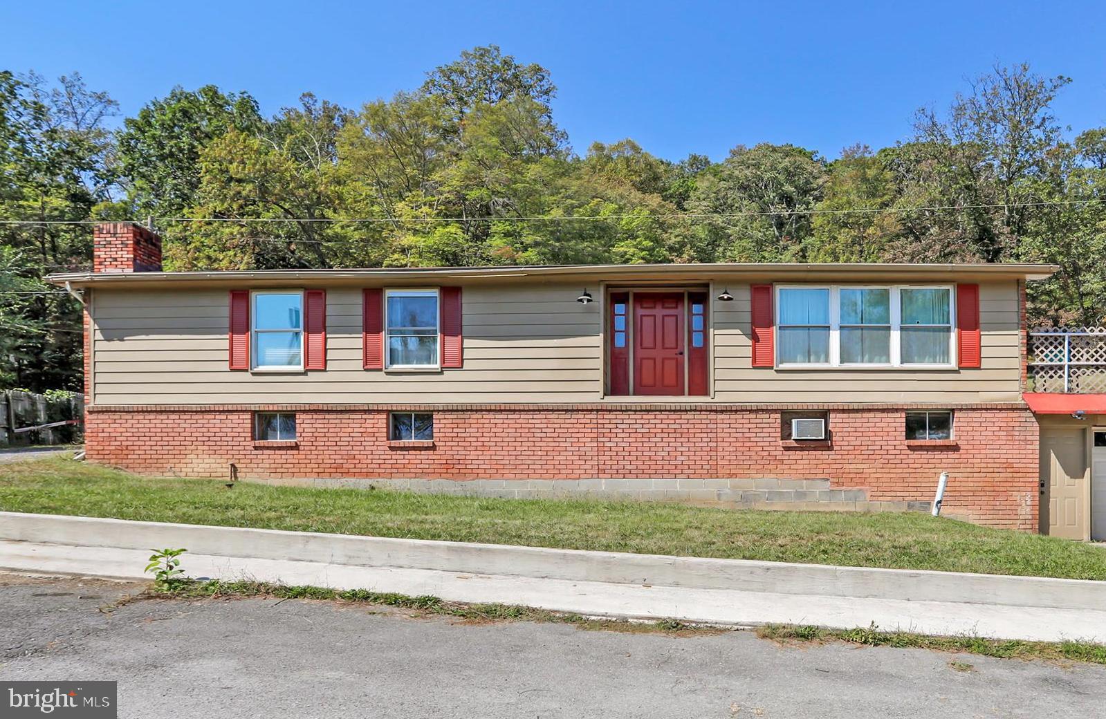 Charming 3-Bedroom Home with Updates & Great Outdoor Space – Convenient to I-68

Welcome to 12303 McMullen Hwy SW, Cumberland, MD! This well-maintained 3-bedroom, 1.5-bath home offers comfortable living, modern updates, and a highly convenient location just minutes from I-68, shopping, dining, and nearby amenities.

Step inside to a bright layout featuring an updated kitchen, modernized bathrooms, and a cozy sunroom perfect as a reading nook, office space, or additional living area. The home includes a full basement providing excellent storage, workshop potential, or room to finish for additional living space.

Enjoy outdoor living on the rear patio, ideal for grilling, relaxing, or entertaining. The property offers off-street parking.

Whether you're searching for your first home, downsizing, or investing, this property checks all the boxes with updates, convenience, and charm. Schedule your tour today!
