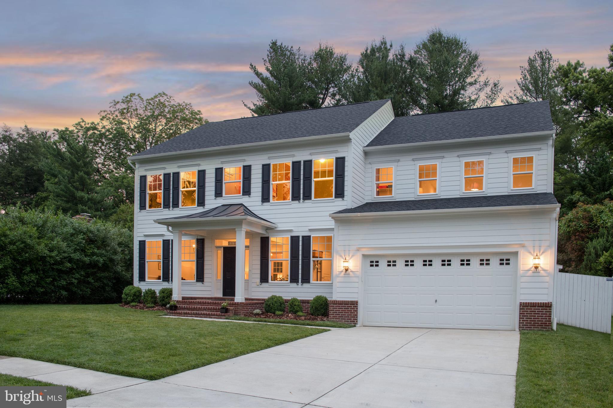 By Appointment Only following all safety protocols.  Click camera icon for virtual tour. Irresistible on Rockmont.  Classic. Current. Captivating.  Custom built in 2017 to capitalize on natural light throughout the day on the incredibly private 1/4 acre cul-de-sac lot.  Sounds idyllic, right?  Well, it is!  Flowing, flexible floor plan features heart of the house kitchen open to family room with fireplace. Crisp white cabinetry, stainless appliances and a huge island make this the quintessential gathering spot.  Light, light everywhere thanks to high ceilings, floor to ceiling windows and a sunroom, with vaulted ceiling,  on the back opening to the fenced yard.  Open, bright and warm all at the same time. Main level library/study tucked into the back corner offers a quiet  place to read and work. The traditional gathering room overlooking the front yard is the perfect place for piano or conversation. On the upper level, well, you've finally found five bedrooms: the luxurious owner's suite, a second en-suite bedroom and three others that share an oversized hall bath.  Upper level laundry room is an added bonus.  Expansive lower level rec room hosts games and good times with room for guests in the bedroom with full bath.  Tons of lower level storage and the opportunity for a second laundry room round out the picture. A dreamy dream come true just around the corner from Haycock Elementary and less than two miles to WFC Metro.  Location and Value ++
