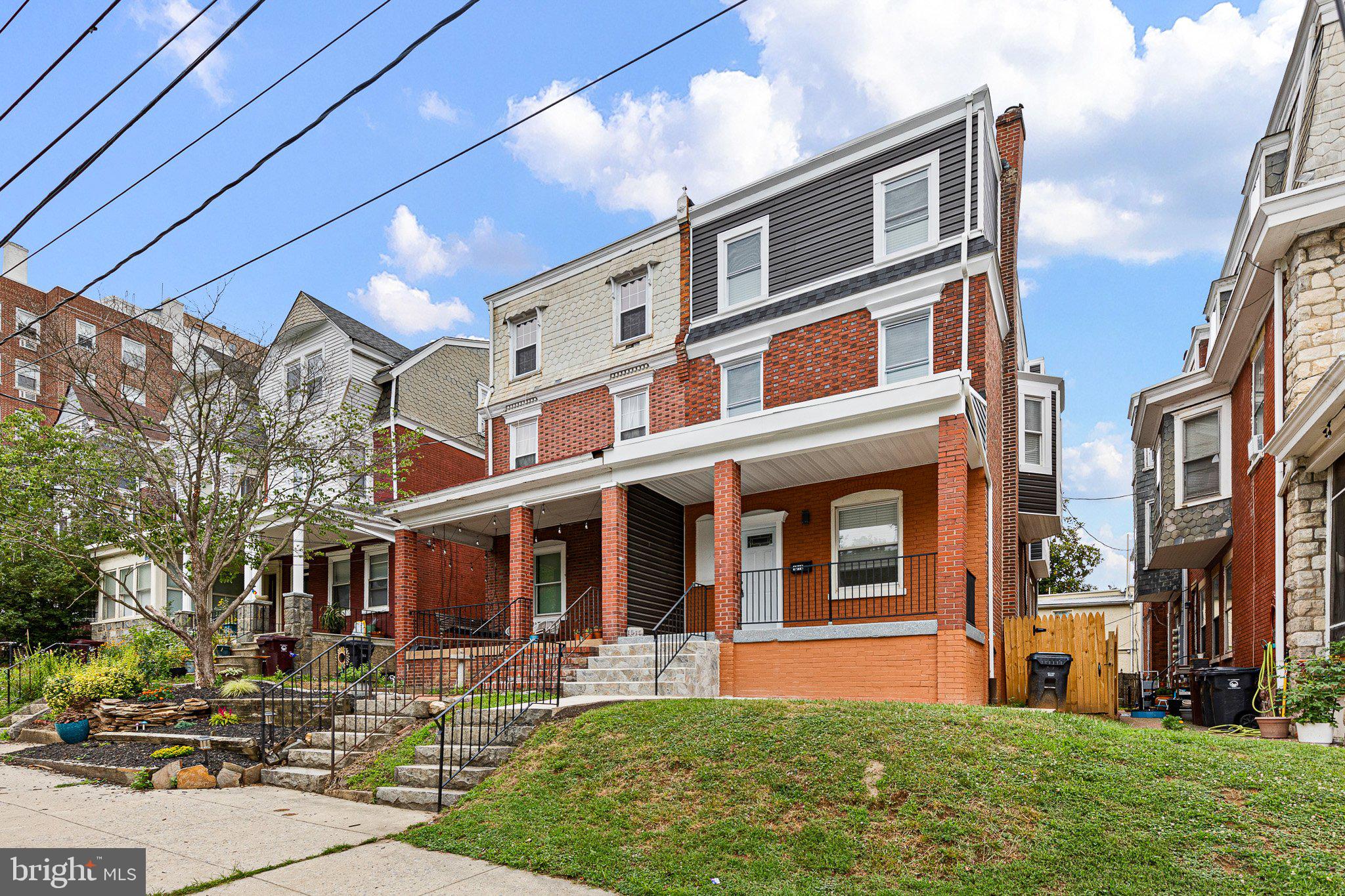 Welcome to this character-filled 3-story twin home Fully Renovated located in the highly sought-after Trolley Square neighborhood of Wilmington, Delaware. Nestled on a tree-lined street just steps away from local cafes and parks, this spacious property offers  open floor plan  The home features  5 generously sized bedrooms, 3.1 full bathrooms, and retains much of its original charm,  and tall ceilings. The main level includes a   living room with open dining area, and open kitchen  with island breakfast bar and New White 36" Cabinets, Quartz Counter tops and Stainless Steel Appliances with Gas Cooling  exits to a private fenced backyard and large Paver patio—perfect for relaxing or entertaining. The second floor hosts two large bedrooms and 2 full bath and a third room  that could be a den / sun room.  The third floor can has 3 additional bedrooms, and a roof deck and another full bathroom. The full unfinished basement offers plenty of storage. Home has 2 Zone Heating and Air Conditioning.  Gas Heating plus a 2nd Floor Heat Pump. Plus a 2nd Floor Laundry.
