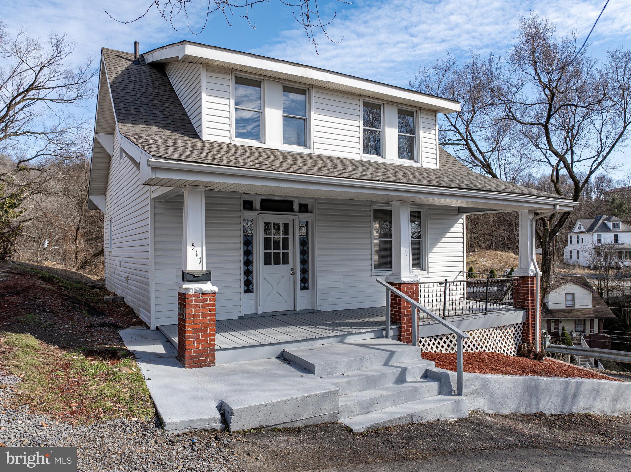 All Reasonable Offers will be considered! Welcome to 511 City View in Cumberland, MD — where the name truly says it all. Perched on a hill overlooking the city, this beautifully fully remodeled 3-bedroom, 2-baths home offers approximately 1,400 square feet of finished living space and breathtaking panoramic views right from your front porch.
Enjoy peaceful mornings and relaxing evenings on the covered front porch, where the entire city stretches out beneath you — a rare and stunning setting that perfectly captures the charm of “City View.”
Inside, the home has been completely updated with modern finishes throughout, including a brand-new kitchen, fully renovated bathroom, fresh paint, updated lighting, and more.Brand New Roof and every detail has been thoughtfully refreshed, creating a move-in-ready space that blends comfort and style.
Situated on a 0.11-acre lot, this property offers a manageable yard while being conveniently located just minutes from downtown, shopping, dining, and everyday essentials. You’ll love the combination of quiet hillside living with easy access to everything the area has to offer.
Whether you’re a first-time buyer or looking for a turnkey home with character and views, this one is a must-see. Washer/Dryer will be installed soon!