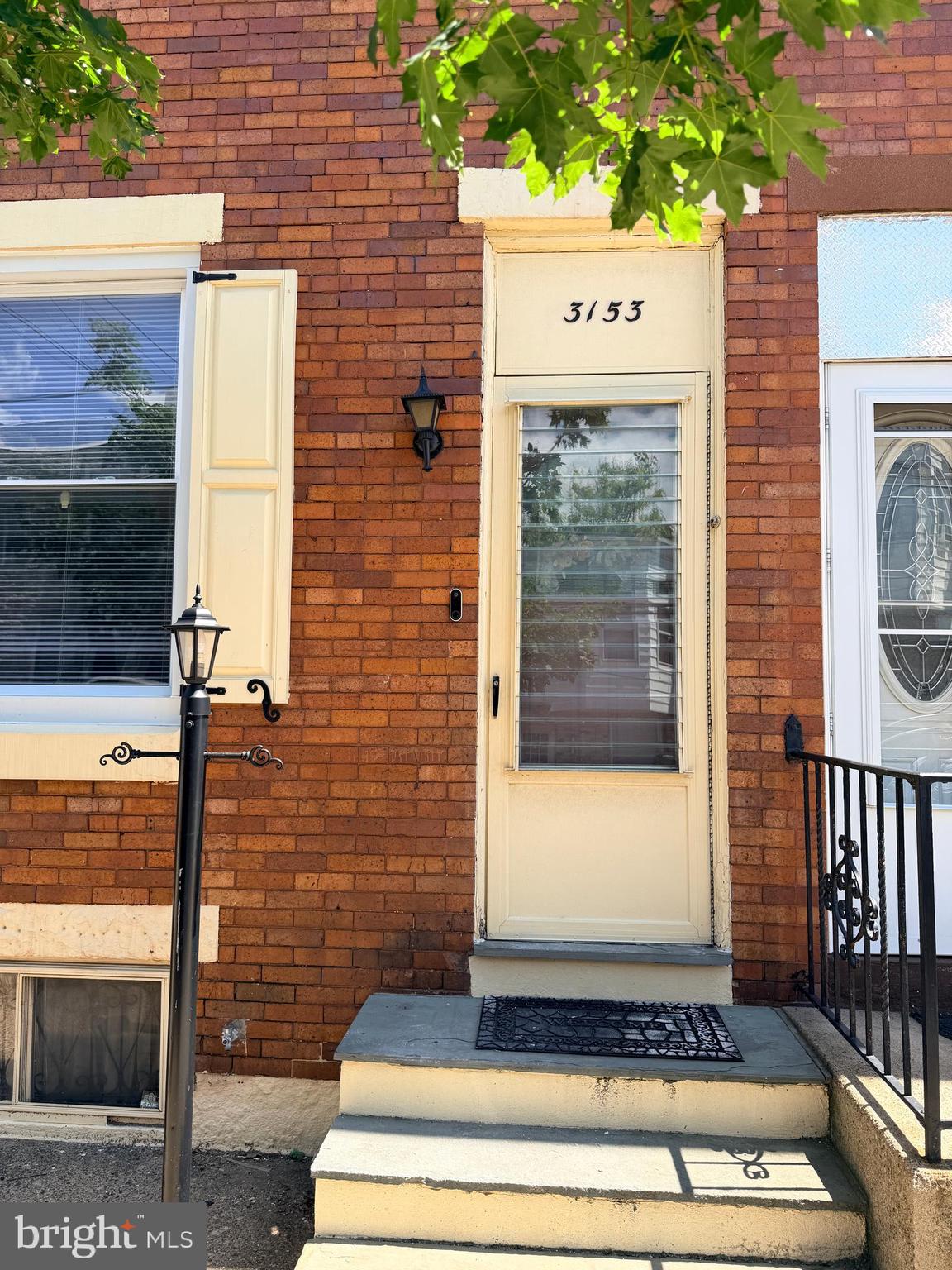 Welcome to 3153 Memphis Street located in Port Richmond.  As you enter the home, you will find a spacious and bright living room with laminate hardwood flooring, flowing seamlessly into a formal dining room that is ideal for both everyday living and entertaining.  The eat-in kitchen offers generous counter space and rich wood cabinetry.  From the kitchen, you have access to the fenced rear yard which creates an inviting outdoor retreat—perfect for summer barbecues, gatherings with friends and family, or simply relaxing in your own space.  Upstairs, the second floor features two comfortably sized bedrooms and a tastefully updated full bathroom. Fresh neutral paint and new carpeting throughout the hallway and bedrooms add to the home’s move-in-ready appeal.  The full basement provides excellent versatility, with space for a laundry and utility area as well as abundant storage. Conveniently located near public transportation, schools, shopping, and restaurants, this home offers both comfort and accessibility. Schedule your showing today and experience all that this charming starter home has to offer.