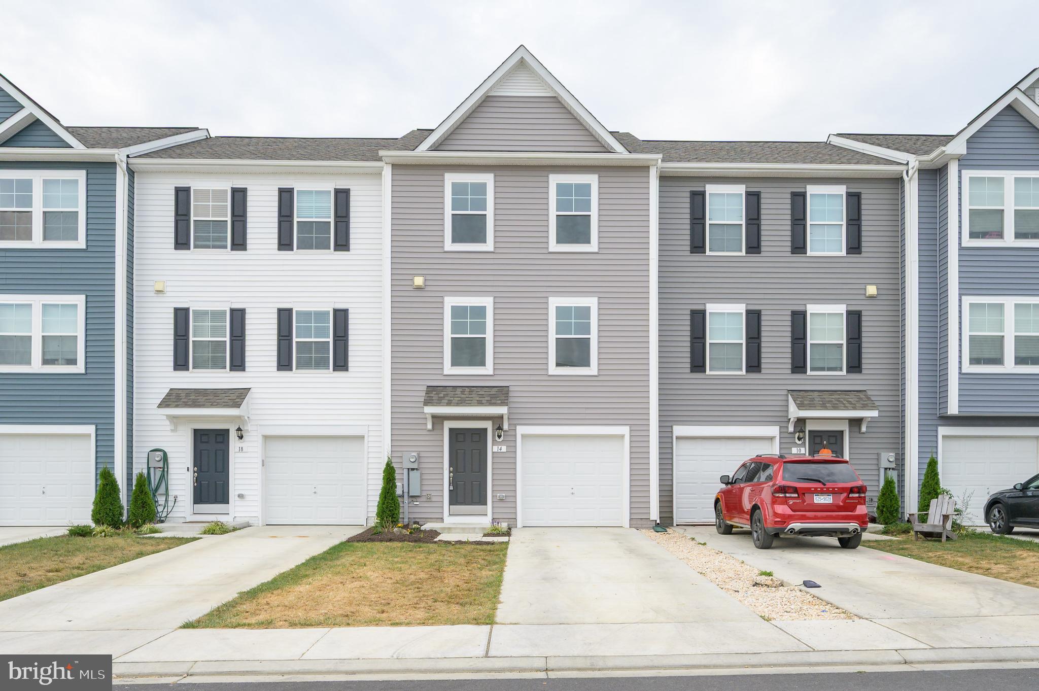 Move-In Ready & Priced to Sell!
Welcome to 14 Colchester Court in McCauley Crossing, Bunker Hill! Built in 2023, this like-new townhome offers 3 bedrooms, 2 full baths, 1 half bath, and 3 levels of living space. The lower level includes garage access, utilities, backyard entry, and an unfinished rec room with bathroom rough-in, ready for your finishing touches. The main level features an open floor plan with natural light, a stunning kitchen with quartz countertops, stainless steel appliances, pantry, and oversized island. Upstairs, the spacious primary suite with walk-in closet & en-suite bath is complemented by two additional bedrooms, full bath, and upper-level laundry. Attached garage, paved driveway, and guest parking add convenience, while the backyard is a blank canvas for you to make your own. Minutes to Inwood, I-81, and the VA border, this home is the perfect mix of comfort and convenience. Don’t miss it, schedule your showing today!