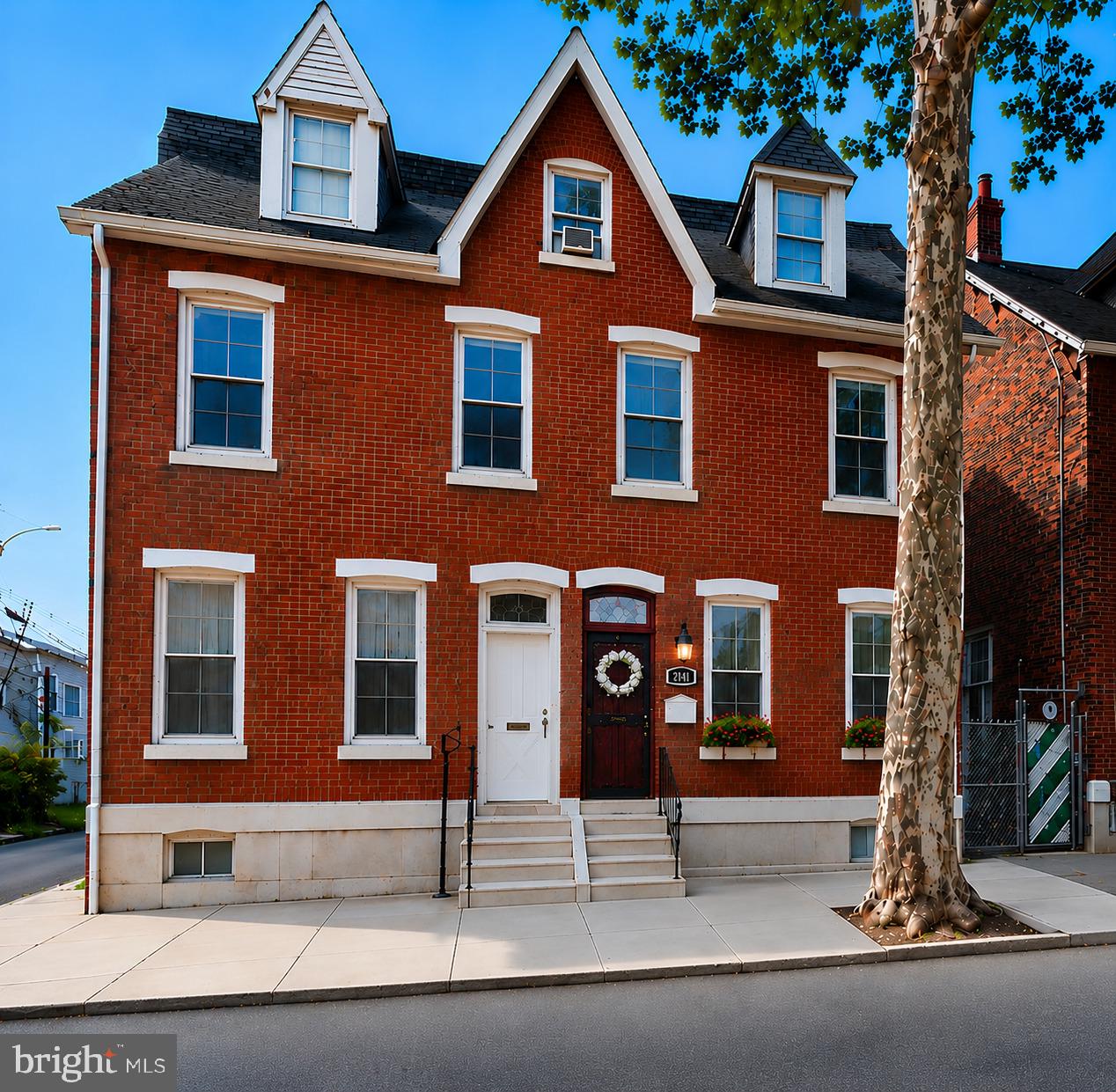 This well-maintained residence, originally built circa 1925, seamlessly combines historic charm with modern enhancements. Offering 7 bedrooms and 2 full bathrooms, the home features a spacious and flexible floor plan while retaining many of its original architectural details, including the classic staircase and distinctive curved design elements that reflect its timeless character.

The property is currently leased under a long-term master lease agreement with PadSplit, which rents the individual bedrooms to separate occupants. Monthly income fluctuates based on room occupancy but averages between $6,000 and $7,000 per month. PadSplit receives 8% of the gross monthly rental income for property management services, while the owner is responsible for all utilities.

The renovated kitchen is equipped with stainless steel appliances and updated finishes, complementing the home's blend of historic appeal and modern convenience. Both full bathrooms have been updated, with one located on the main level and the second situated upstairs.

Two additional bedrooms have been added on the first floor near the front entrance. The second floor contains three bedrooms, while the upper level provides two additional rooms, bringing the total bedroom count to seven. This versatile layout is ideal for large households, shared living arrangements, guest accommodations, or home office use.

Significant system upgrades include a new boiler and a new central air conditioning system, enhancing year-round comfort and efficiency. The property also offers a full unfinished basement with laundry facilities and abundant storage space. A washer is currently installed, and a new dryer is scheduled to be added.

Outside, the fenced rear yard provides a private outdoor setting suitable for relaxation, gardening, or entertaining.

With seven bedrooms, multiple bathrooms, and a strong income-producing setup, this property presents an attractive investment opportunity with excellent cash flow potential and long-term growth prospects.

The home is conveniently located approximately four minutes from the Lancaster Avenue and 43rd Street transit stop, offering easy access to the Route 10 trolley line (13th-Market to 63rd-Malvern) and the Route 43 bus line (Richmond-Cumberland to 50th-Parkside), making travel throughout Philadelphia convenient and accessible.

Residents can also enjoy nearby outdoor spaces, including Lee Park and Durham Park, which provide additional recreational opportunities within the neighborhood.

Blending historic character, modern improvements, generous living space, and convenient access to public transportation, this distinctive Philadelphia property offers a unique opportunity for both investors and owner-occupants alike.

Schedule your showing today.