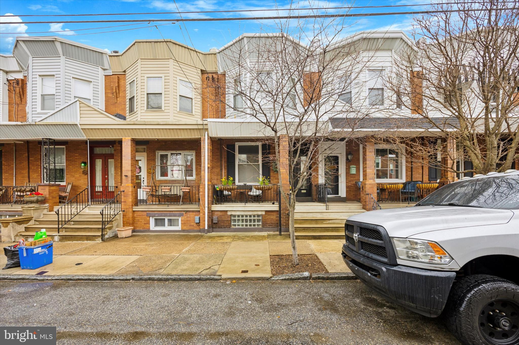 It's just in time for front porch season and 3157 Gaul Street is ready for it's new owners to call it home. Located on one of Port Richmond's most desirable blocks this charming 3 bedroom, 1.5 bathroom home checks all the boxes. This home has many unique and historic details throughout. Enter through the double doors and tile vestibule and into the large living room complete with hardwood floors, electric fireplace and mantle, and large front window. Past the living room there is a designated dining area and spacious kitchen with stainless steel appliances, island and ample storage space. The kitchen and dining area have 4 full windows allowing for tons of natural light. Behind the kitchen is a convenient laundry room and separate half bath. Out back, you'll find a second outdoor space, and on the lower level bonus space with tons of potential.
Upstairs are 3 bright and well sized bedrooms with tons of natural light, including the front bedroom with original built-in closet. The spa-like 4-piece full bathroom rounds out this floor. Transit is a breeze with several bus lines running on Allegheny and easy highway access. Explore neighborhood gems like Neme, ReAnimator, and the Richmond Flea Market, or pick up some fresh produce at the Farmer's Marketin Campbell Square.