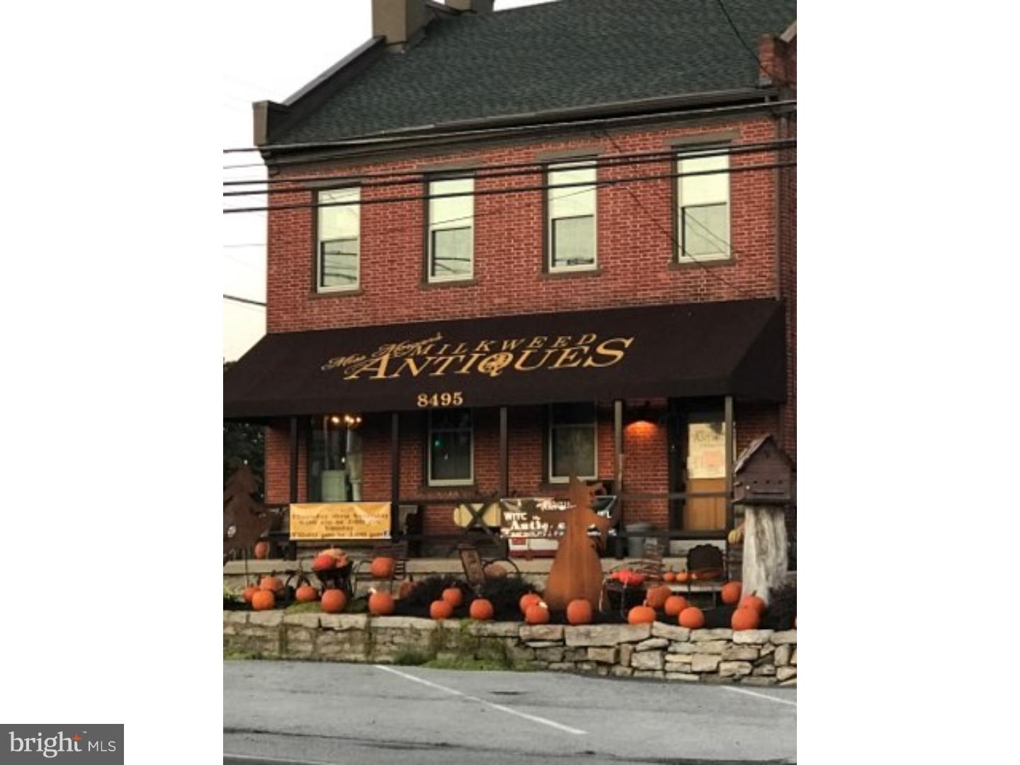 Completely Renovated 3,000 SF Brick Building built in 1816, on corner lot along Rts 501 and Old Rt 22.  This property is in excellent condition inside & out and includes 1.) 900 SF retail store front with a half bath; 2.)  Up & down 2 Bedroom unit (was last used as commercial space, but can easily be restored to an apartment) & 3.)  2nd floor 1 bedroom apartment with separate outside entrance.  All units have Central Air and are separately metered.  Property is zoned Village District which allows many uses including Retail/ Office/ Medical/ Restaurant, etc.  Located just 30 minutes from Allentown, Reading, Hershey & Lititz.
