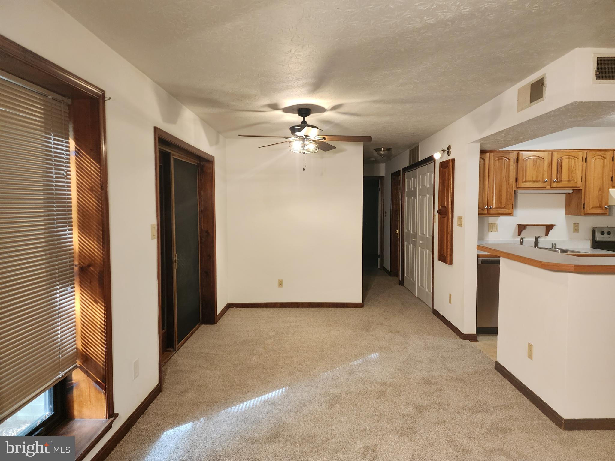 Perfect location in the desirable Wildewood Community. Charming condo with ground level patio backing to trees! Master bedroom with walk in closet and own half bath. Washer and Dryer in the unit. Walking distance to restaurants and shopping.