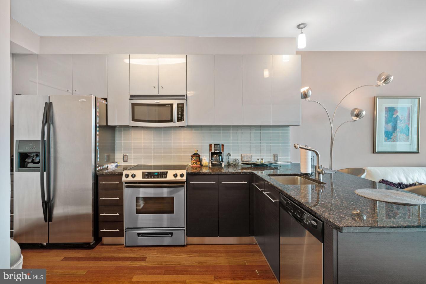 1ST FLOOR PARKING SPOT INCLUDED! Modern Urban Sanctuary with Art Museum Views + Parking & Storage
Welcome to Residence 2608  at The Murano, a luminous 1-bedroom, 1-bath retreat spanning approximately 743 square feet, complete with assigned garage parking and a separate storage locker -- rare perks in this market.
Step inside to discover north-facing, floor-to-ceiling windows that flood the space with natural light while framing iconic Art Museum and city skyline views. This sleek, open-concept layout is elevated by hardwood floors, 9-foot ceilings, and fine details like custom automated shades, blackout curtains in the bedroom, and built-in closet systems.
The kitchen is designed for both style and function: granite counters, stainless appliances, and a clean, modern aesthetic. In-unit convenience continues with full-size, front-loading washer and dryer tucked away discreetly.
When it comes to amenities, The Murano delivers a full suite of luxury services: 24/7 doorman/concierge, fitness center with Peloton bikes, a 60-foot indoor pool, a sundeck for lounging al fresco, and an elegant residents' lounge for entertaining or quiet escapes.
Location is everything, and this residence is at the heart of it all. You'll walk to Trader Joe's in minutes, and hop over to Rittenhouse and Walnut Street for world-class dining and shopping. Commuters will appreciate the proximity to 30th Street Station, UPenn/Drexel, and Philadelphia's major hospitals--everything is within reach.
Your next move is clear: this is not just a condo, but a lifestyle. Schedule your private showing today.