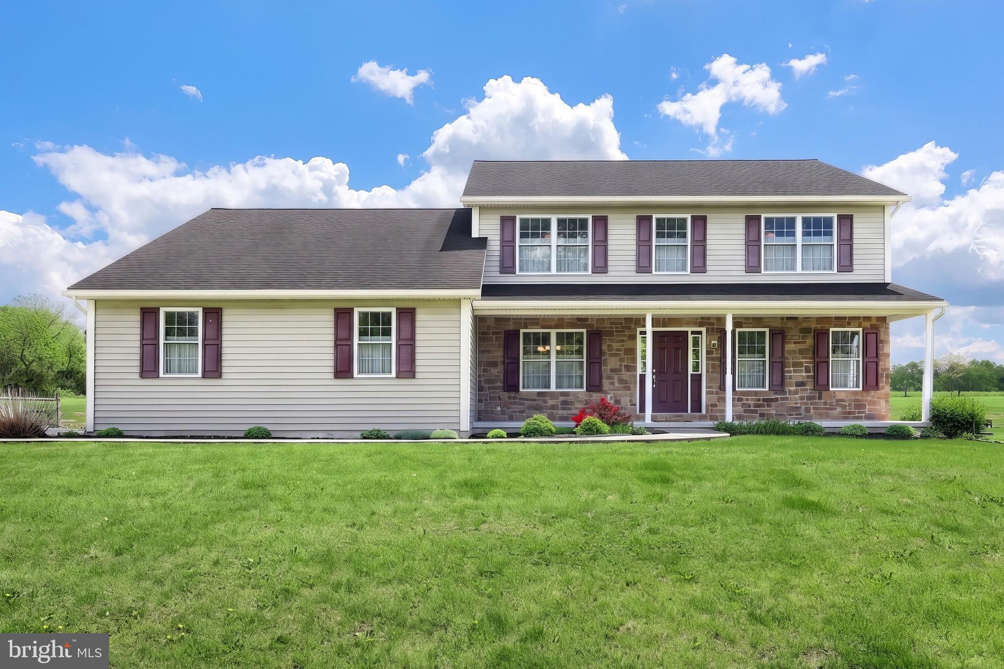 Custom-built one-owner traditional 2-story situated on 4.2 private acres, just minutes from Gettysburg and convenient to Route 15 for commuters. This 2,700 sq. ft. home offers 4 bedrooms and 3 full baths, including a first-floor bedroom with full bath for flexible main-level living, guests, or in-law needs. Inside, the home features a comfortable, well-planned layout with generous room sizes and an inviting flow for everyday living and entertaining. The open kitchen serves as the heart of the home, with easy access through patio doors to a covered rear patio overlooking the 18x36 inground pool with sand filter. The home sits back off the road, backs to farmland, and is bordered by trees along the front and sides for a quiet, peaceful setting. Features include well water, on-lot septic, dual-zone propane heat, central air, covered front porch, attached 2-car garage, and detached 2-car garage with covered patio. Come see this like-new home in a great location, just in time to build a year of summer memories with all this property has to offer.