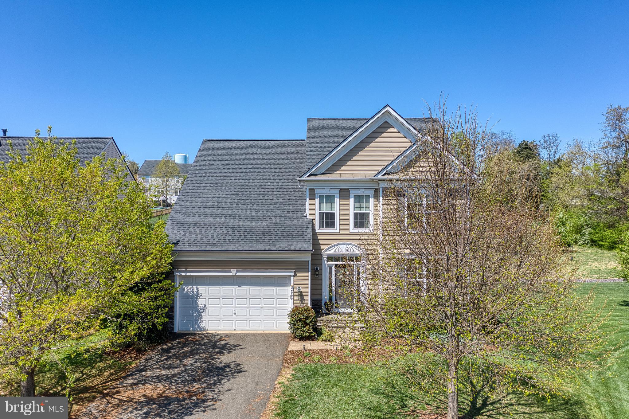 Welcome home to this gorgeous, well-appointed 4BR/2.5BA colonial, perfectly tucked away in a peaceful cul-de-sac. Designed for both comfort and style, this home offers spacious living areas, modern upgrades, and an incredible outdoor retreat—ideal for relaxing and entertaining.

Step inside to find beautiful LVP flooring throughout the main level, installed just a year ago. A dedicated home office provides the perfect space for working from home, while the spacious living room, complete with a cozy gas fireplace, is perfect for gatherings. The country kitchen is a true showpiece, featuring an island with seating, stunning custom cabinetry, built-in shelving, granite countertops, stainless steel appliances, and motion-activated pantry lighting. A formal dining room with chair rail and a bright breakfast area offer multiple options for dining, while the lovely sunroom off the kitchen allows you to soak in natural light year-round.

Upstairs, the luxurious primary suite boasts a tray ceiling, walk-in closet, and a private bath with a soaking tub, walk-in shower, and double vanity. The additional bedrooms are spacious and share a well-appointed full bath with a double vanity and a separate toilet and shower area. Convenience is key with an upper-level laundry room featuring solid wood shelving for extra storage.

The fully finished basement expands the home’s possibilities with an oversized rec room, a craft room, a second office, an exercise room, and a large storage area. Whether you need extra space for hobbies, work, or play, this lower level has it all.

Outside, the backyard is a true oasis, just in time for spring and summer. A stamped concrete patio offers the perfect setting for outdoor dining and relaxation, while the fully fenced yard, lined with vinyl fencing, provides both privacy and security. Strategically planted trees add an extra layer of seclusion, creating a serene retreat right at home.

With both Comcast and FIOS available, staying connected is easy. This home is the perfect blend of style, functionality, and relaxation—don’t miss the chance to make it yours. Schedule your showing today!