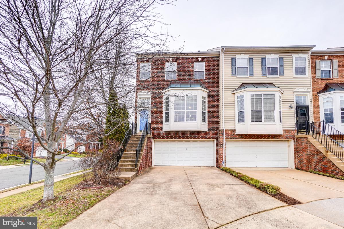 GORGEOUS, LIGHT, AND GLEAMING END UNIT TOWNHOME,  W/ A TWO-CAR GARAGE. THE FIRST LEVEL COMES  W/ A HARDWOOD FLOOR, A LIVING AND DINING ROOM & AN OPEN KITCHEN W/ 42 IN  CABINETS, AND A SLIDING GLASS DOOR TO THE DECK. 2ND LEVEL COMES WITH W/ A HUGE MAIN BEDROOM W/ A CEILING FAN, FIREPLACE, SOAKING TUB, DOUBLE VANITIES, A SEPARATE SHOWER, AND A WALKING CLOSET. TWO ADDITIONAL BEDROOMS W/ CEILING FAN AND A FULL BATHROOM. THE LOWER LEVEL HAS A FAMILY ROOM, AN OFFICE SPACE, AND A FULL BATHROOM......AN OUTSIDE ENTRANCE TO THE BACK AND A FRONT ENTRANCE TO THE GARAGE. WALKING DISTANCE TO KINGSTOWNE CENTER, MOVIES, RESTAURANTS, AND SHOPPING. MINUTES TO VAN DORN AND SPRINGFIELD SUBWAY STATION AND METRO BUS STATIONS.