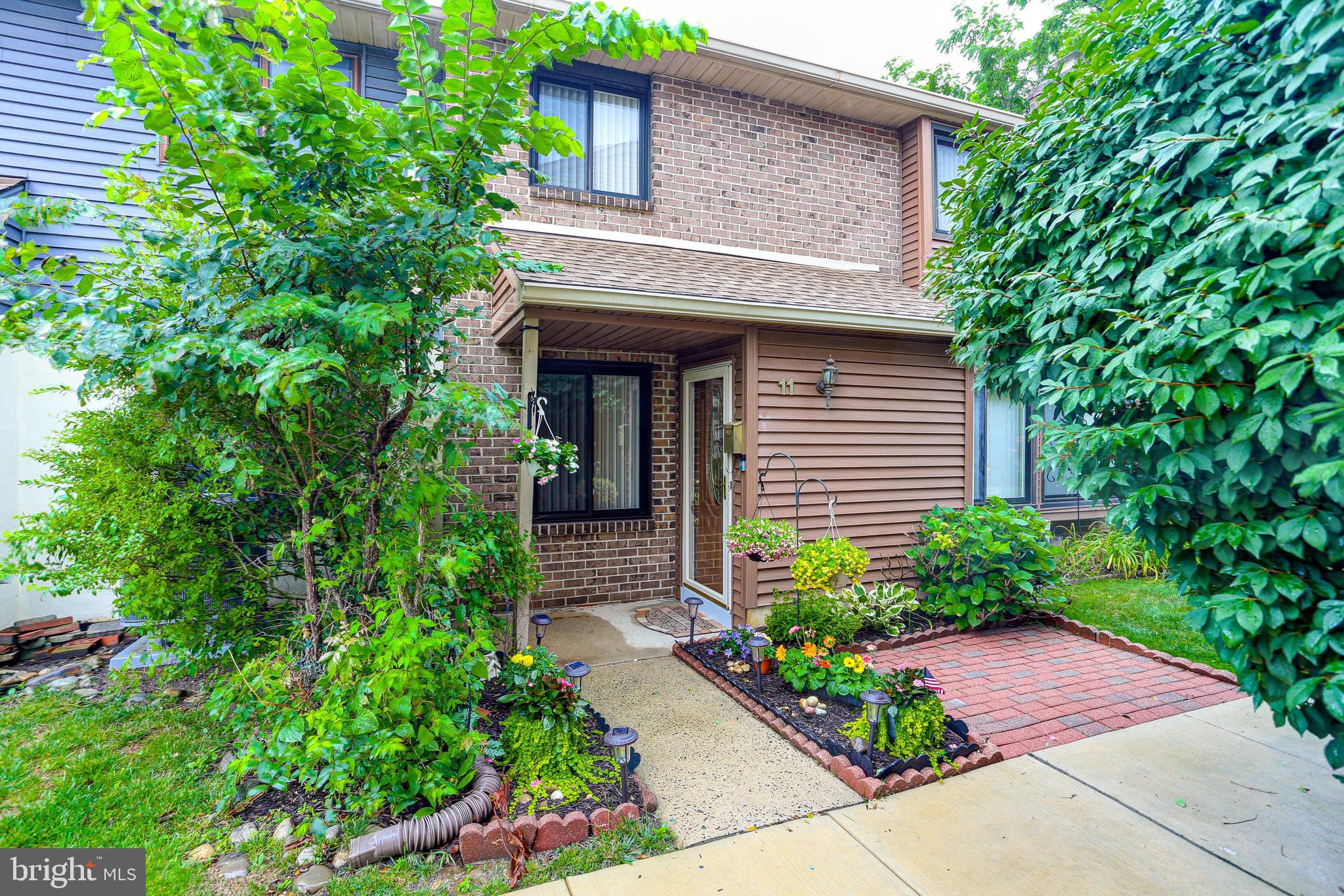 Welcome to 22 Fitzwatertown Rd E #11, a beautifully maintained 2-bedroom, 1.5-bath townhome in the desirable International Village community of Upper Moreland Township. This move-in ready home has been meticulously prepared, is clean, inviting, and ready for its next owner.

Inside, you'll find a functional layout designed for comfortable everyday living. The spacious kitchen offers abundant cabinetry and generous countertop space, providing plenty of room for meal preparation, storage, and entertaining. Throughout the home, you'll appreciate the exceptional storage options, including custom closet organizers in both bedrooms, additional storage in the bathrooms, and extra closets in the finished basement to keep everything neatly organized. The basement also features a sub-panel, complementing the home's upgraded 200-amp electrical service.

Additional improvements include a whole-house surge protector for added peace of mind and a sump pump with battery backup to help protect your investment.

Outside, enjoy the convenience of ample parking in the spacious community lot. The location is hard to beat, with quick access to the Pennsylvania Turnpike, as well as Whole Foods, Sprouts Farmers Market, numerous restaurants, shopping, and everyday conveniences just minutes away.

Don't miss this fantastic opportunity to own a charming, well-maintained townhome in a highly convenient location. Schedule your private showing today!