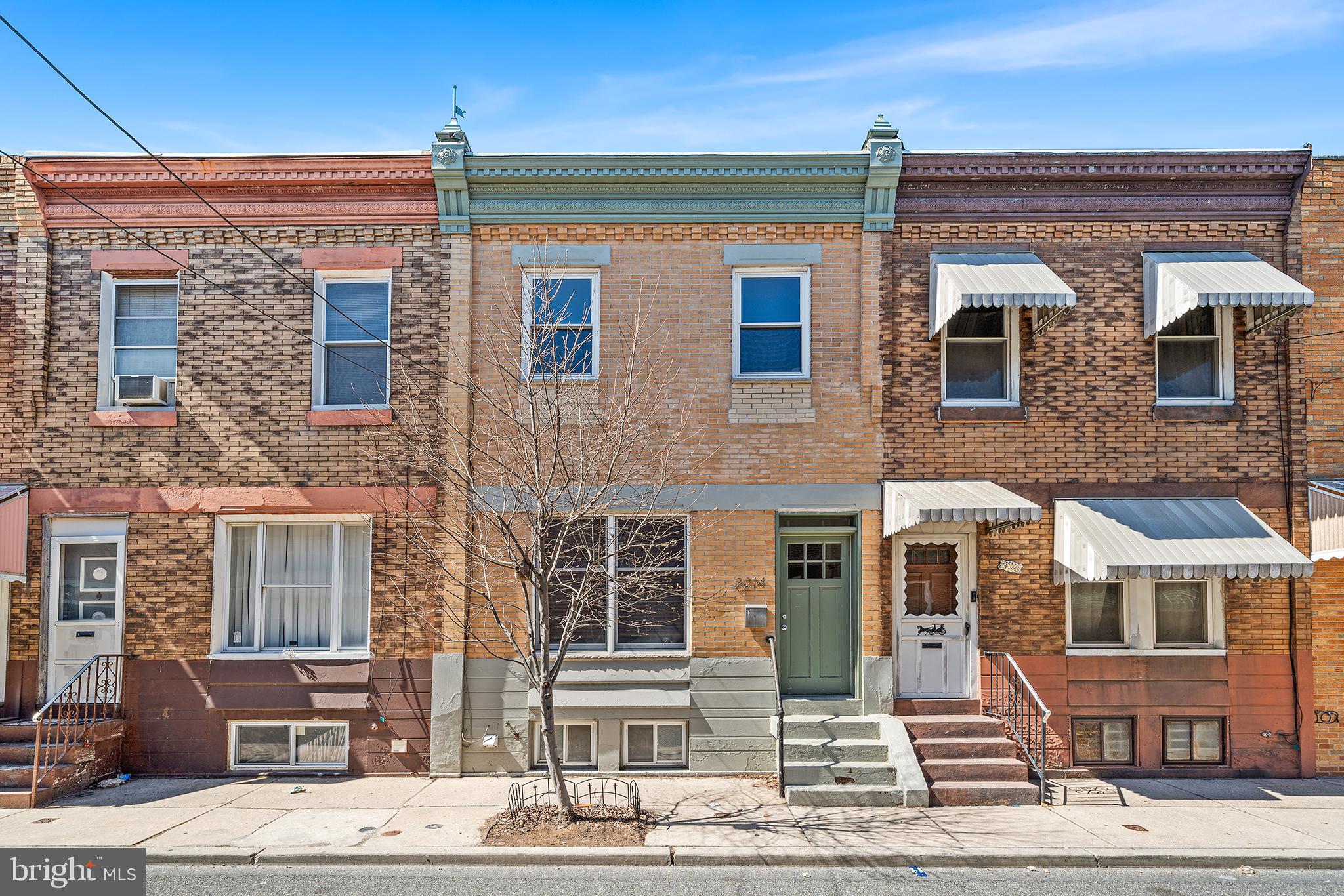 2214 S Hicks is a wonderful 3 bedroom, 1.5 bath home on a quiet street in West Passyunk! The charming vestibule welcomes you into a sunny living room, with convenient first floor powder room. A separate dining area leads into the spacious and modern kitchen. The kitchen boasts tons of cabinetry and generous counter space; a kitchen equipped for a home chef! Off the kitchen is a quaint patio, ready for grilling and gardening. Upstairs you'll find three bedrooms, all with their own charm. The front bedroom is spacious and sunny with an original built-in wardrobe closet. The middle room is cozy, perfect for a home office or nursery. The third bedroom is a true sanctuary - generously sized and quiet, sitting on the back of the home. The renovated full bathroom is lovely and modern, with botanical tiles and natural light. It includes a bathtub and shower combo. The basement has laundry and room for storage. West Passyunk is conveniently located near the Broad St Line, East Passyunk's shops and restaurants - and West Passyunk hits like Cafe Nhan, Cafe y Chocolate, Second District Brewing, and Stina Pizzeria. Come see this light-filled and delightful home!