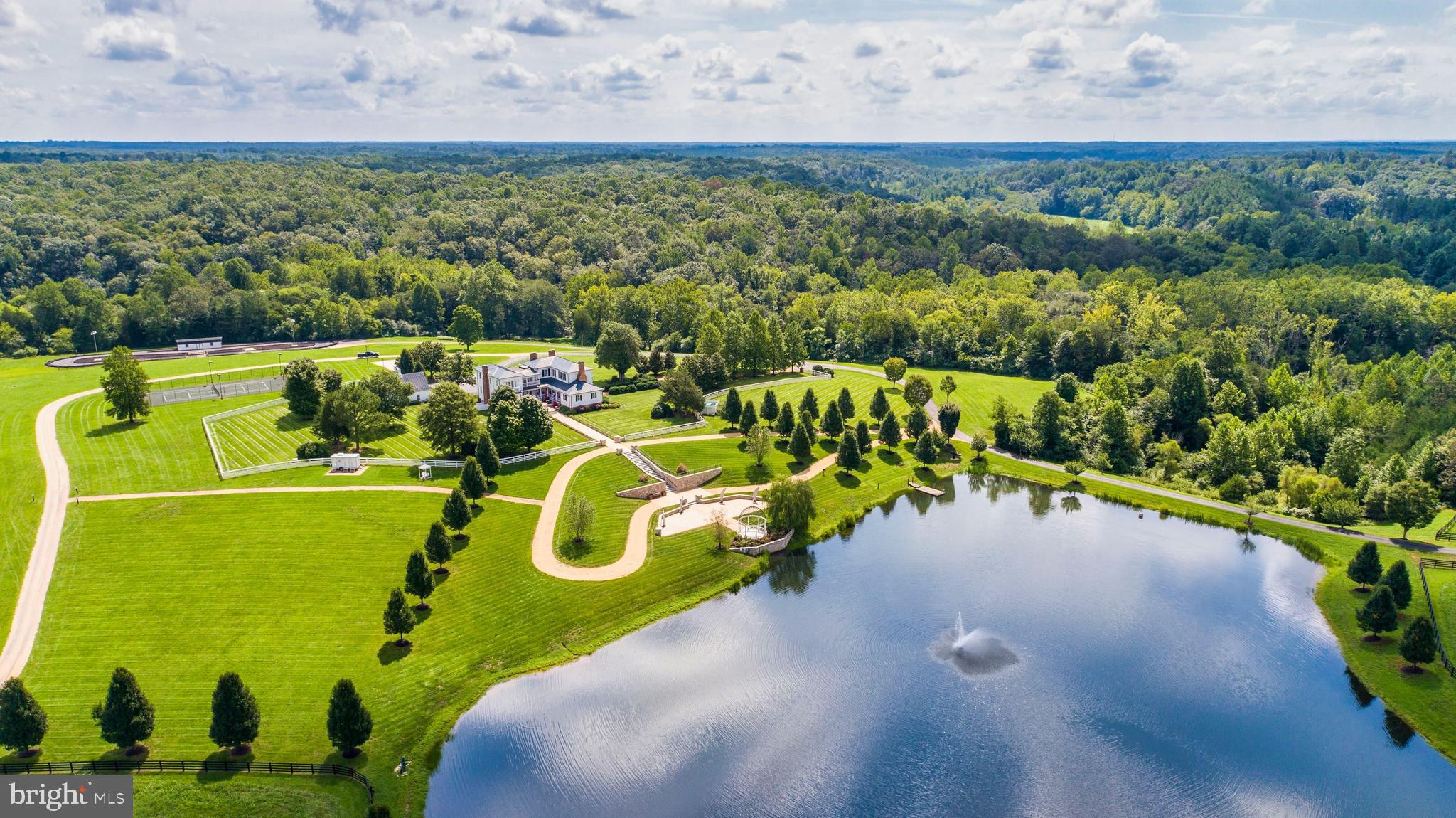 Mount Ida Reserve is a once-in-a-lifetime opportunity located just outside the vibrant city of Charlottesville, Virginia, and only minutes from the stunning Trump Winery, Albemarle Estate, and The University of Virginia. Nestled in the heart of Southern Albemarle County along the historic Blenheim Road, this extraordinary property is surrounded by world-class attractions, including Monticello, Ashlawn Highland, Dave Matthews' Blenheim Vineyards, Grace Vineyard, and Steve Case's Early Mountain Vineyard. This premier location offers a unique chance to own a piece of Virginia’s most distinguished landscape.

The former estate of Bernard Arnault, Mount Ida Reserve, has been meticulously transformed over the past two decades by its current owners. Boasting more than twice the acreage of nearby Trump Winery & Estate, this property stands out for its unparalleled scale and physical features, including miles of private river frontage, stunning mountain views, rolling hills, fertile farmland, hardwood forests, and a privately owned 45-acre lake with pristine beaches.

Free from conservation easements, the property offers endless possibilities for development or preservation. The owners have invested significantly in infrastructure throughout the expansive acreage, creating a fully equipped and modernized estate. Highlights include high-speed fiber-optic connectivity, miles of underground power lines, a concrete dam, 15 miles of paved roads, 25 miles of board fencing, and multiple automated wrought iron gated entrances. The property is also supported by five diesel backup generators and features 25 springs, ensuring unmatched self-sufficiency and security.

An impressive collection of structures enhances the estate, including large manor homes and single-family residences, award-winning event facilities, stable barns, storage buildings, and more. This exceptional property is ideal for a family compound, corporate retreat, flagship corporate campus, or a long-term investment opportunity. With 150 by-right parcels, Mount Ida Reserve is also uniquely positioned for future development. Alternatively, it presents an attractive option for conservation or stream impact easements, offering significant tax benefits.

The estate includes well-trained, experienced staff for seamless management and operations, making it a turnkey investment. Additionally, a comprehensive hotel study for a 100-key hotel, prepared by HVS, is available for review. Whether envisioned as a private sanctuary, an iconic event venue, or a development opportunity, Mount Ida Reserve represents an unparalleled offering in one of Virginia’s most celebrated regions.