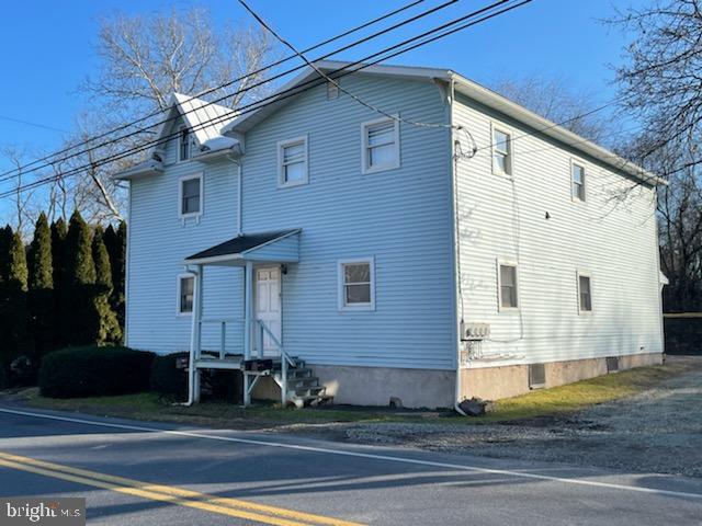 This is a very nice, super clean 2 bedroom 1st floor apartment with only 4 steps to get into the apartment from the rear parking lot.  The unit consists of a large living room, full modern bath, nice kitchen with stove and fridge and 2 private bedrooms.  The tenant here pays electric (including heat and hot water), the owner pays the other utilities.