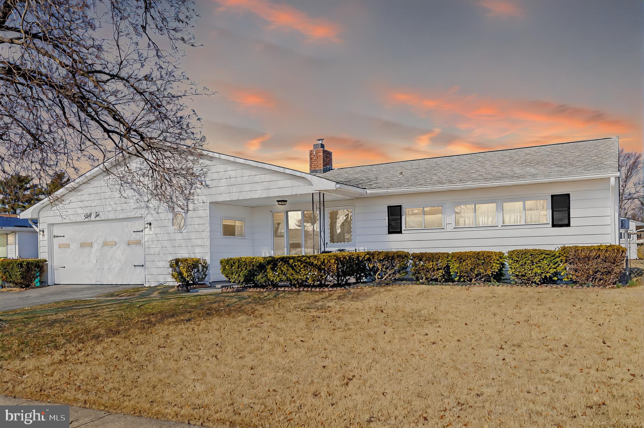 Move right in! This conveniently located 3-bed, 2-bath ranch has been beautifully updated with fresh paint inside and out, along with new flooring. The kitchen boasts ample cabinet space, an electric range, an appliance garage, and a custom-built coffee bar. The versatile bonus room can serve as a primary suite, extra living space, or a rec room. Enjoy spacious closets, a 2-car garage, and a shed for abundant storage. The expansive, fenced-in yard provides plenty of space to run and play. Relax on the covered front porch or back patio, and cozy up by the wood-burning fireplace in the winter. Schedule your showing today!