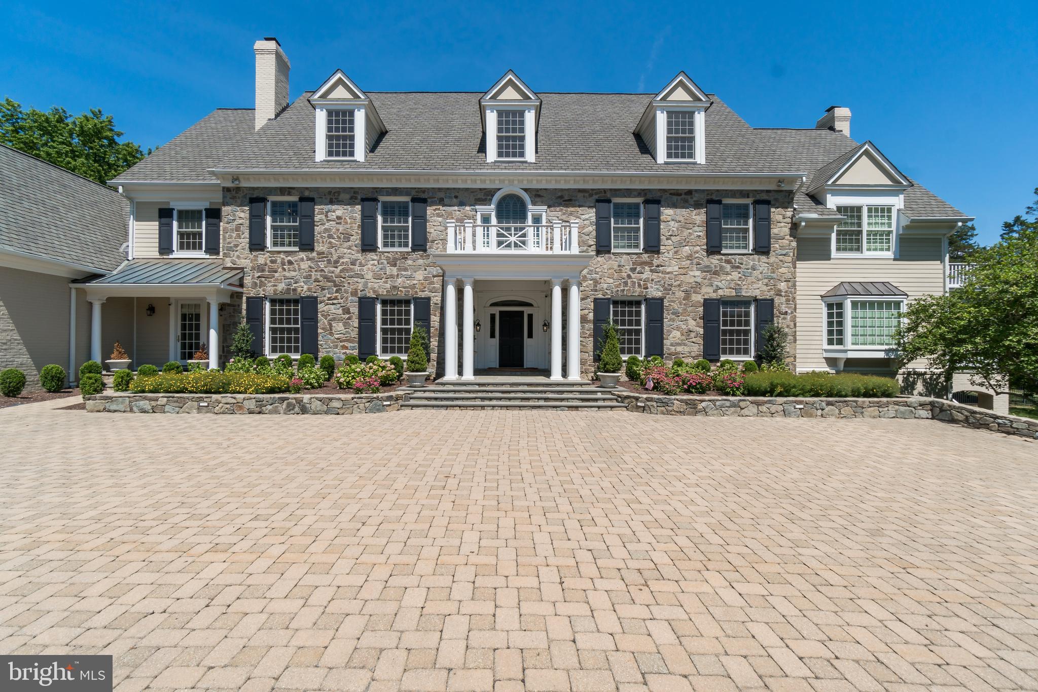 See video tour here >>>>> https://player.vimeo.com/video/439786958 All showings will be accompanied by the listing agent. Magnificent Potomac estate situated on two landscaped acres is an entertainer's dream.  Neighboring the renowned Congressional Country Club and just minutes to D.C.  This home has it all; guest house, pool, hot tub, theatre room, indoor basketball hoop, indoor batting cage, and a putting green.  The main residence has 12' ceilings, oak flooring, top of the line millwork, large mudroom which connects to three of the five garage stalls. The gourmet kitchen offers stainless steel appliances including Sub-Zero refrigerator/freezer, Viking gas-powered range with 6 large burners and griddle, warming drawer, a luxurious island with bar seating, and spacious walk-in pantry.  All of this connects to a catering wing.  The recent, massive family room addition is great for large gatherings. The office and library are located on the main level of the home next to a full bathroom and bedroom. The owner's wing features his and her walk-in closets, sitting room,  fireplace, and large master bathroom with separate vanities.  The upstairs features an additional four bedrooms; each with adjoining bathrooms and walk-in closets.  A laundry room is also upstairs for your convenience.  Also, there's finished space for another home office above the garage. The basement boasts a huge area for entertaining,  wet bar (w/ icemaker, fridge, and dishwasher), fireplace, playroom, two half-bathrooms, a theatre room with a blank canvas ready for you to create your own at-home movie theatre. The adjacent guest cottage was built by Studio Z in 2012.  A wonderful place for guests, self-isolation, at home office, or live-in nanny.  It features a bedroom, full bathroom, sitting area, indoor basketball court ( doubles as a two-car garage), an indoor batting cage, putting green. Loggia is adjacent to the pool, spa, and expansive manicured backyard. Home comes equipped with new high-end windows installed throughout the house,  four new furnaces, new carpet, Sonos sound system as well state of. the art IT networking.  Minutes to all major routes. D.C., downtown Bethesda, Tysons Corner, the C & O Canal, Potomac Village, and much more are just a short drive away.