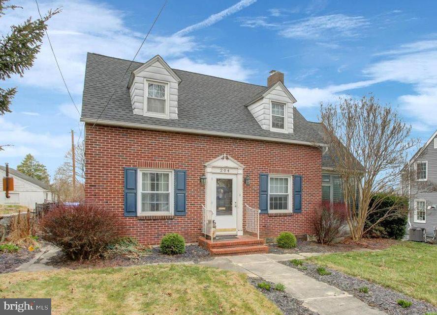 Welcome to this charming Cape Cod w/ full dormer on rear making it live larger than it looks.  Over 1300 sq. ft. of living space, not counting unheated sunroom off LR, that could be converted to full time living space w/some upgrades.  Character and warmth fill the home with wood floors, gas fireplace, arched doorways, gas hot water heat and brick exterior.  Other features include 3 bdrm, 2 ba, full walk-out to grade basement w/garage, fenced backyard, replacement windows, and storage shed.  Paved off street parking for several cars with carport and 1 car garage in basement. NEW ROOF 2023!  Convenient location & priced well...it won't be here long!