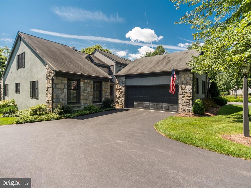 Lovely model at Deer Ford.  Enjoy downsizing into this wonderful 2681 Sq Ft Home.This home features an updated cherry kitchen with granite counter tops and  dry bar, updated master bath with custom cabinets and fantastic walk-in shower, formal dining room, Den or family rm w/bookshelves, beautiful Three Season room for relaxing or entertaining, Bedrooms for family visits, and sleep overs.  Enjoy this updated home that is move in ready.