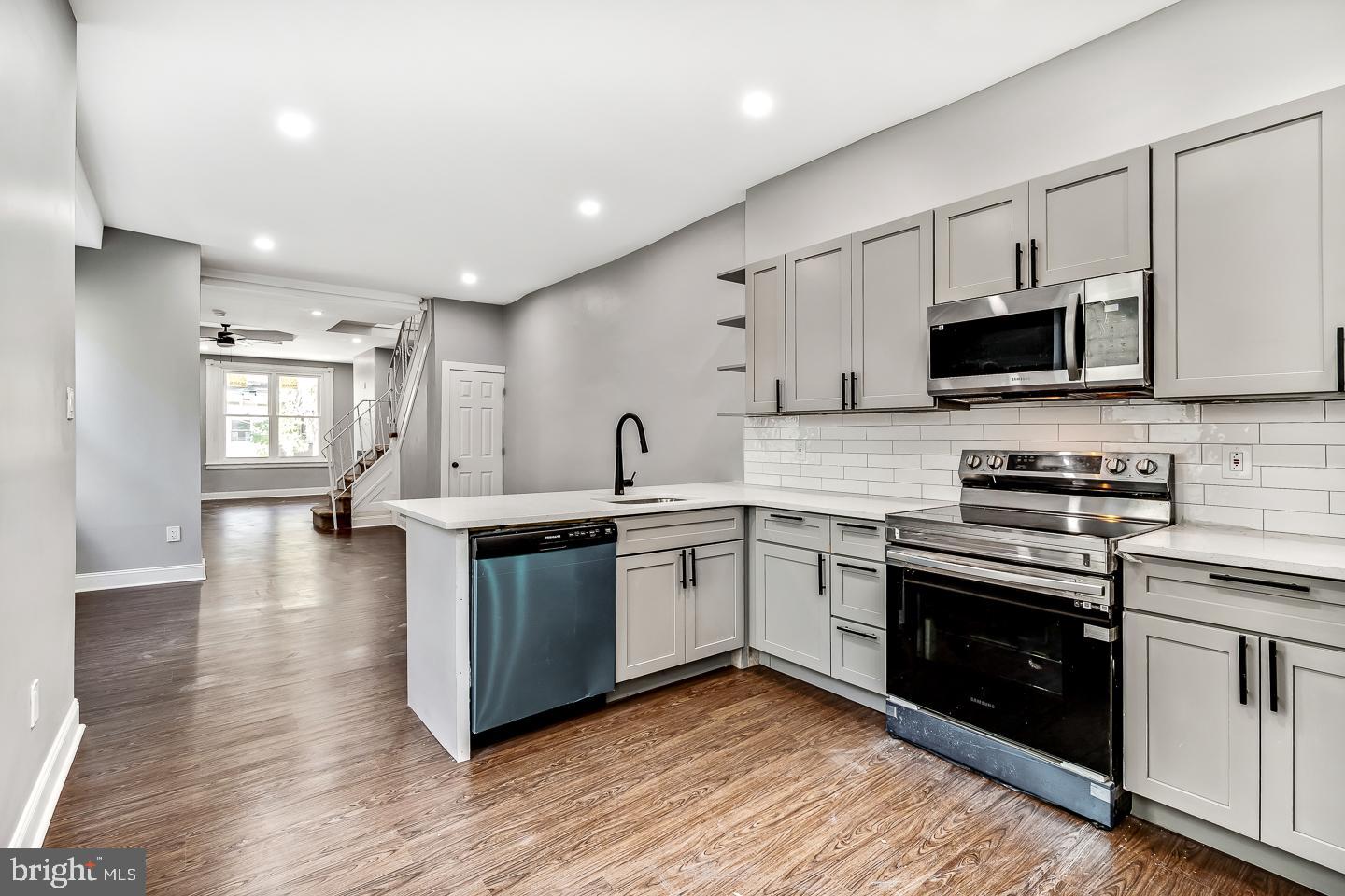Introducing the captivating transformation of 1311 S Ruby Street! Embrace the elegance of this beautifully renovated residence, boasting fresh, stunning hardwood floors that invite you into a modern living space. The newly updated kitchen, complete with access to a charming backyard, creates an ideal setting for barbeques and social gatherings. 

Experience comfort throughout the year with the centralized HVAC system installed in this home. The convenience is elevated with a laundry area strategically situated on the second floor. Delight in the additional living space provided by a fully finished basement. Additional pictures are coming soon. 
Seller is willing offering a $5,000 seller's assist. 

Situated in a coveted location, this home offers the convenience of a mere one-minute stroll to the 13 trolley. Outdoor enthusiasts will adore the proximity to local parks featuring basketball and tennis courts, along with a pool at the Kingsessing Rec Center, not to mention the 51st Street Dog Park and Clark Park for leisure and recreation. A diverse selection of shops, cafes, and restaurants are just a stone's throw away, easily accessible by foot or bicycle.

Do not pass up the chance to make this versatile and superbly located house your new home. Discover the lifestyle you've been dreaming of at 1311 S Ruby St.